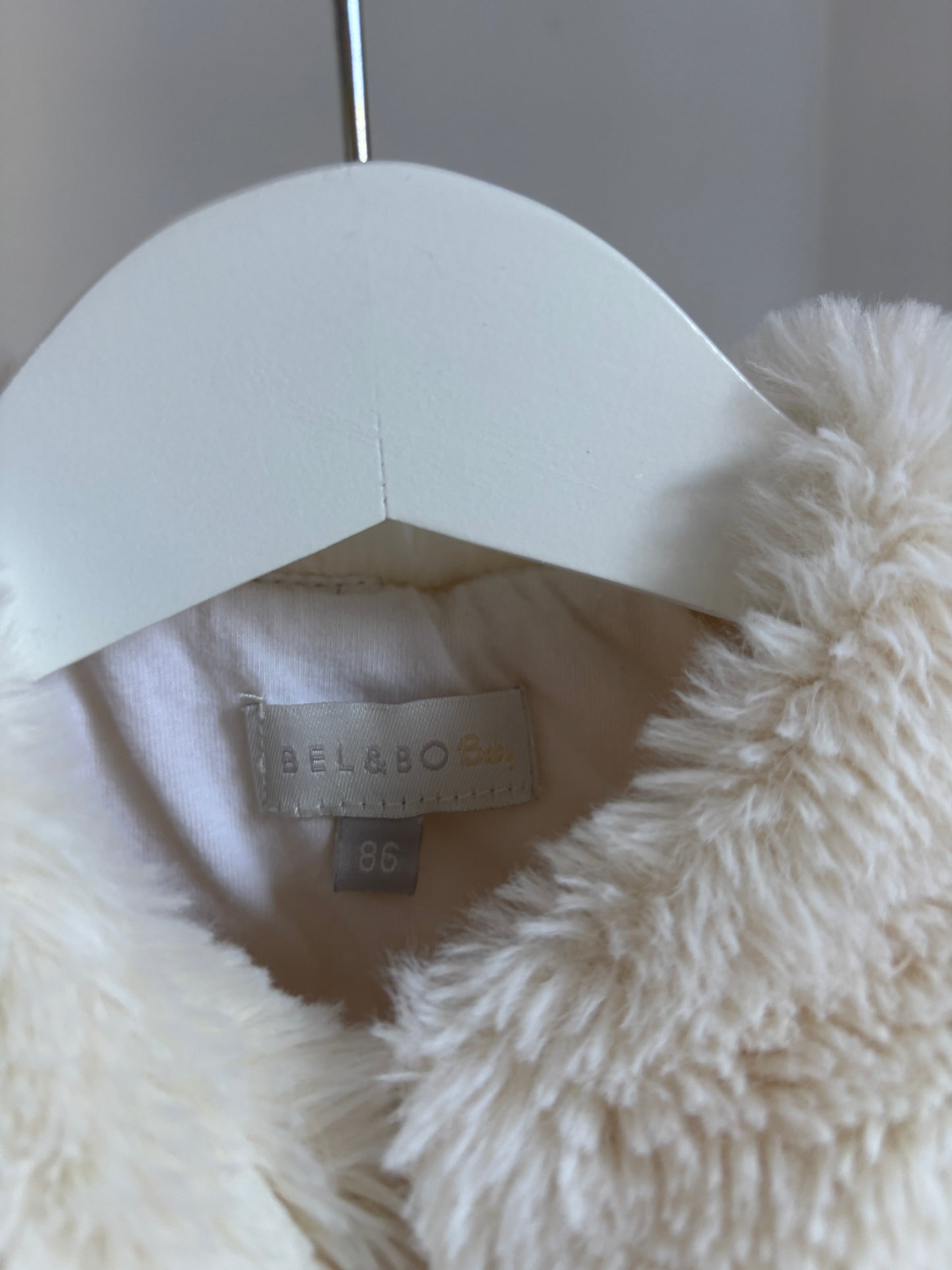 Crèmekleurige bodywarmer