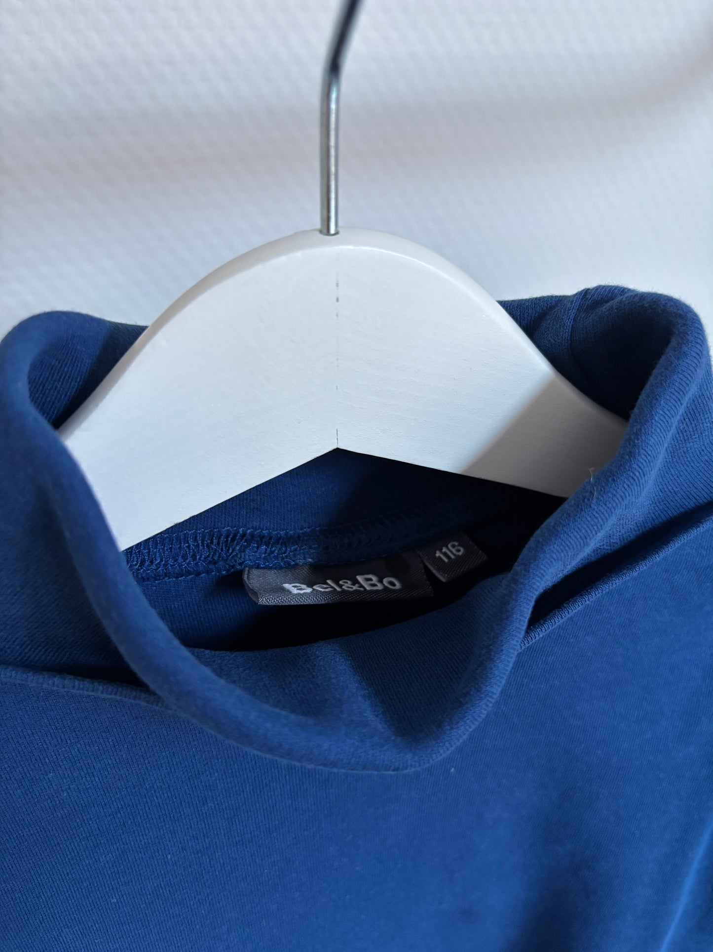 Marineblauwe longsleeve met rolkraag