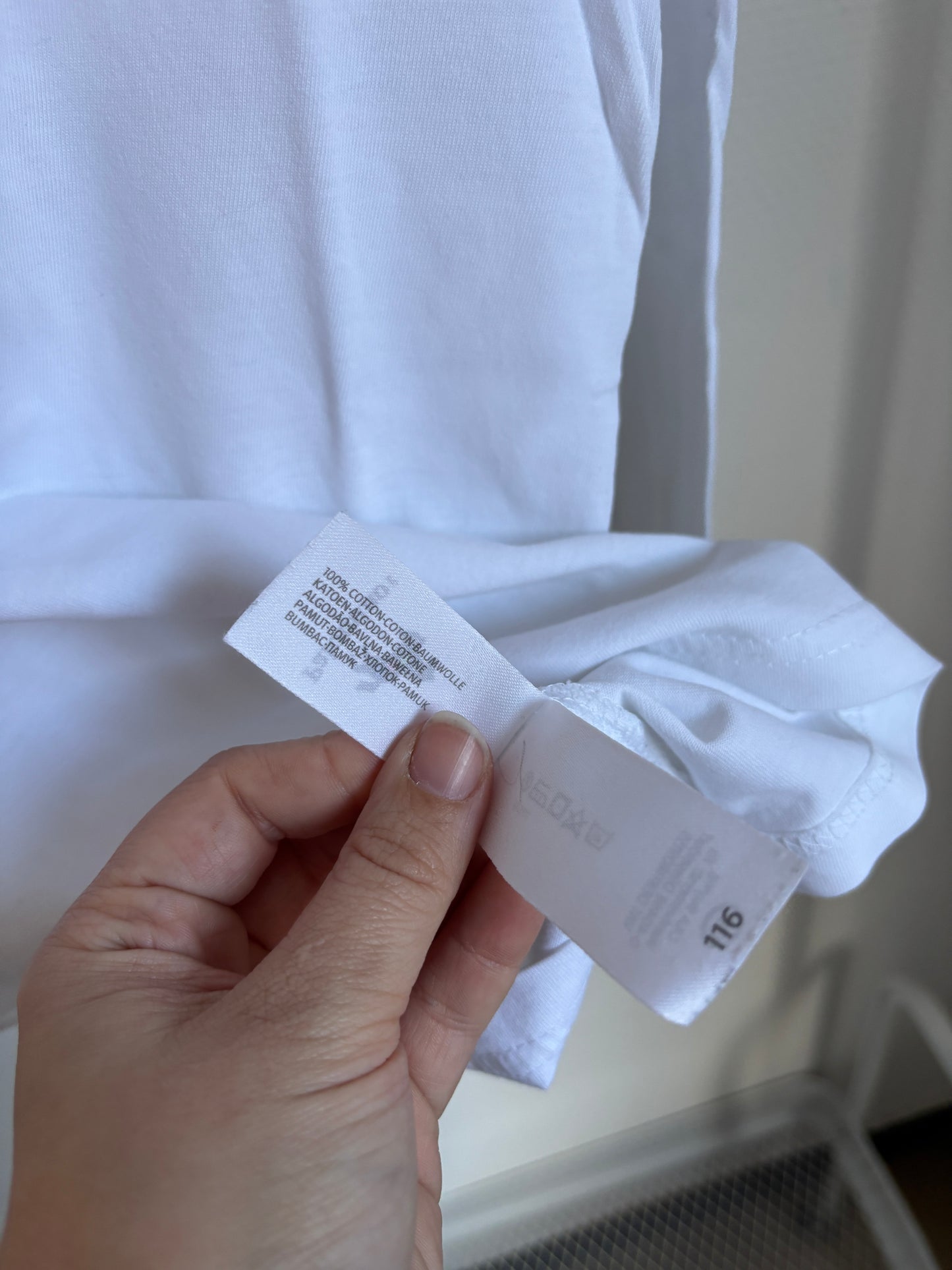 Witte longsleeve met rolkraag