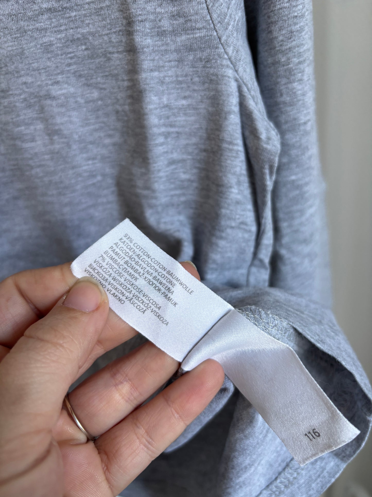 Lichtgrijze longsleeve met rolkraag