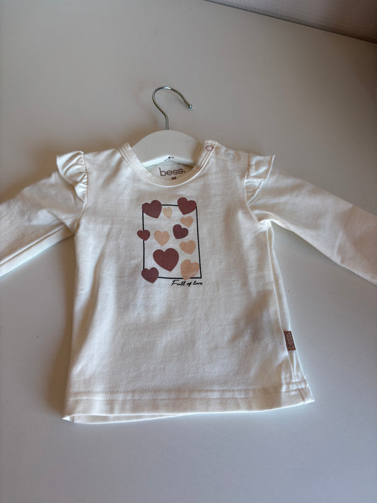 Crèmekleurige longsleeve met hartjes