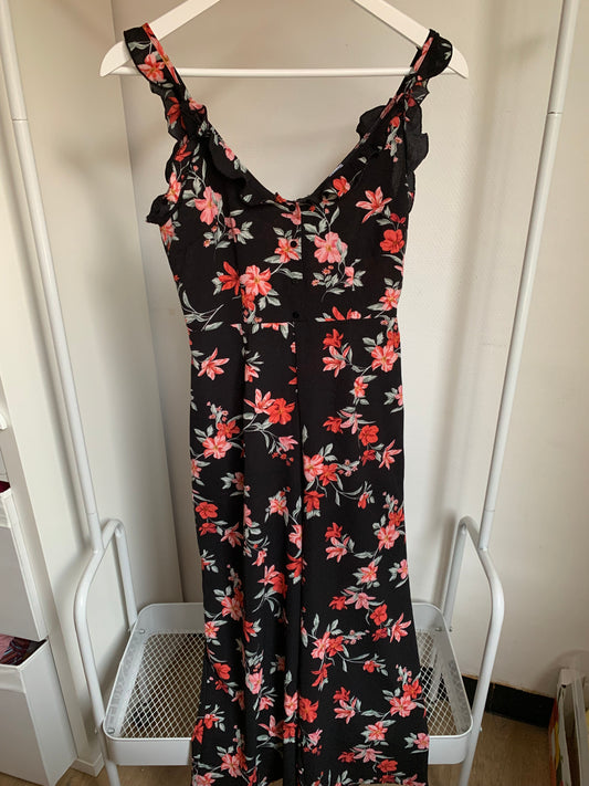 Zwarte jumpsuit met roze bloemen