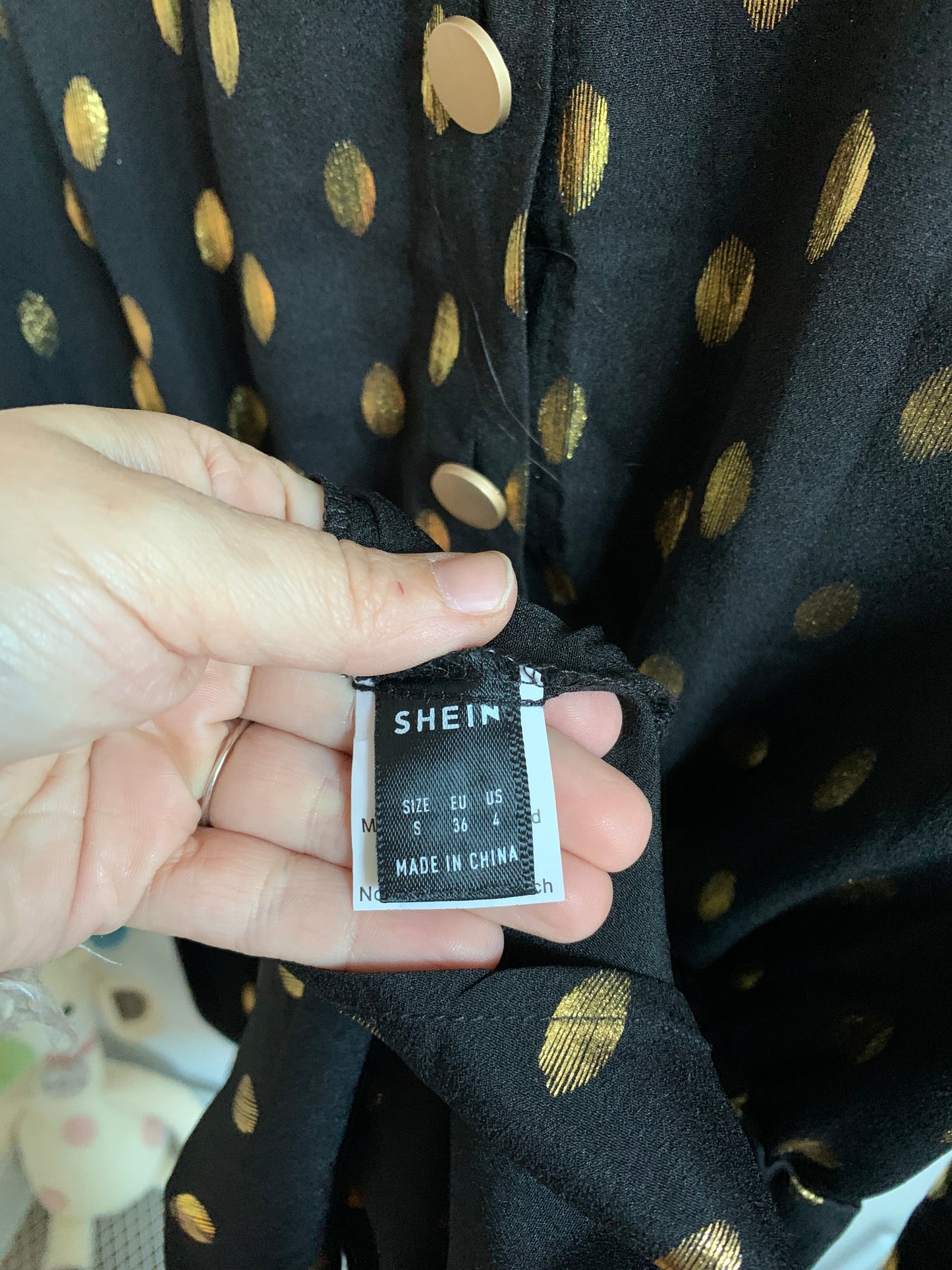 Zwarte gestippelde jurk