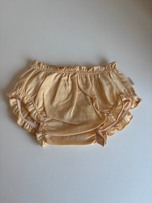 Perzikkleurig pamperbroekje