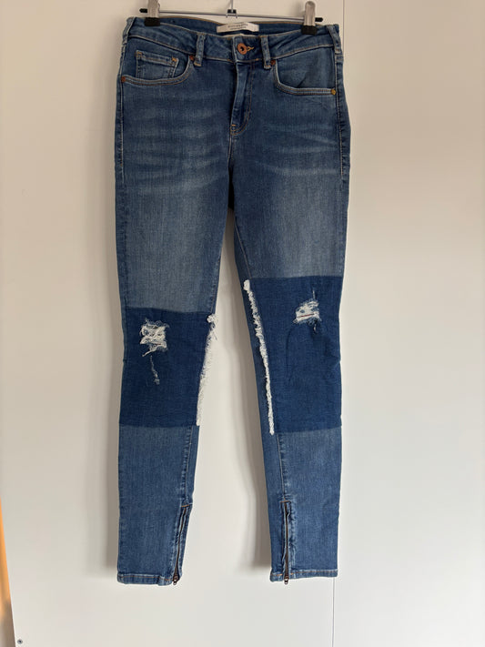 Blauwe ripped jeans