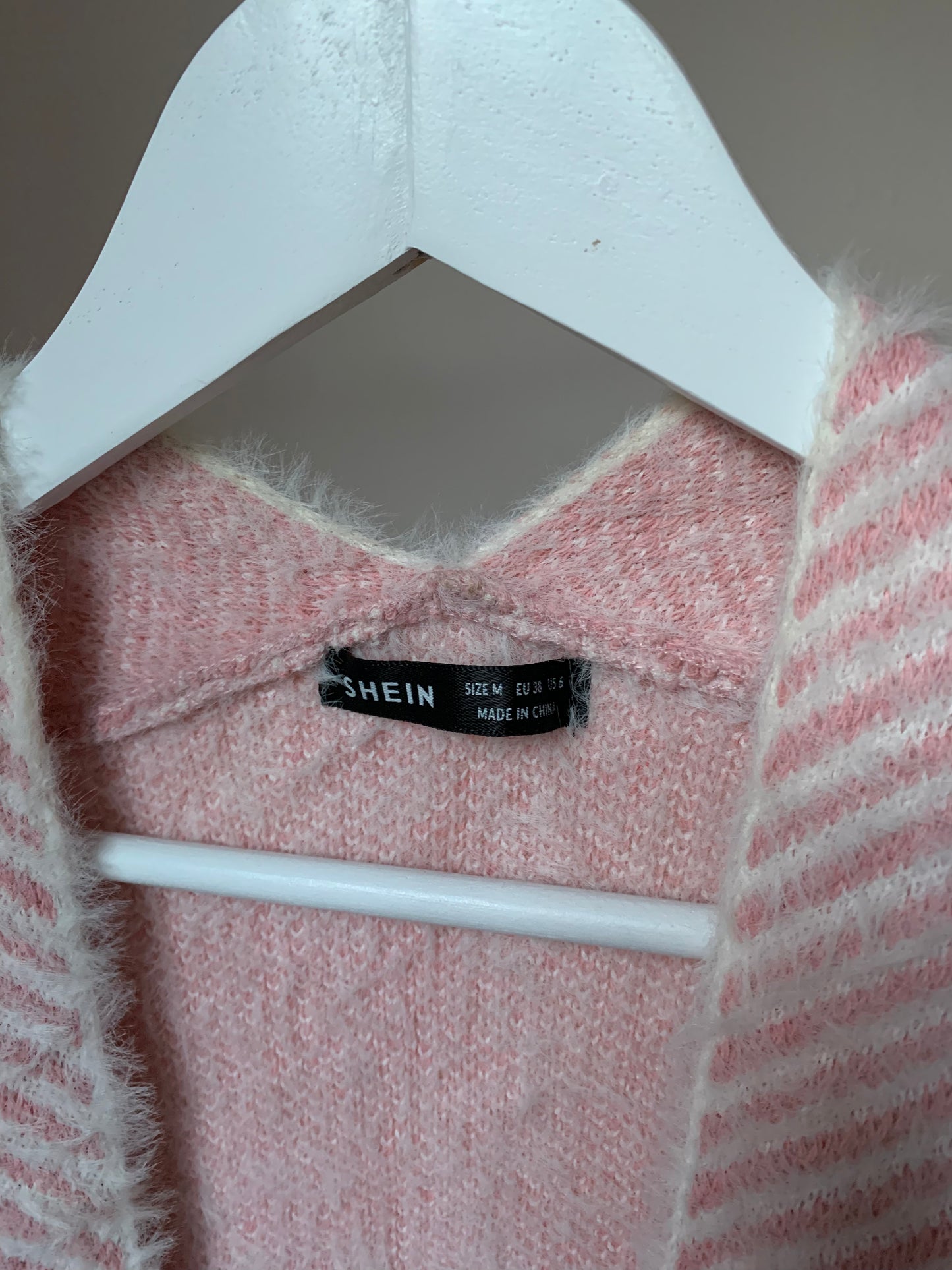 Roze gestreepte vest