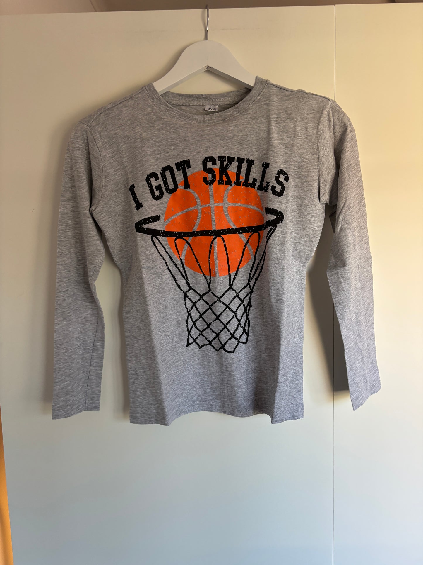 Grijze longsleeve "I got skills"