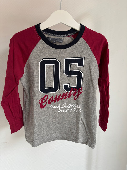 Grijze longsleeve met rode mouwen