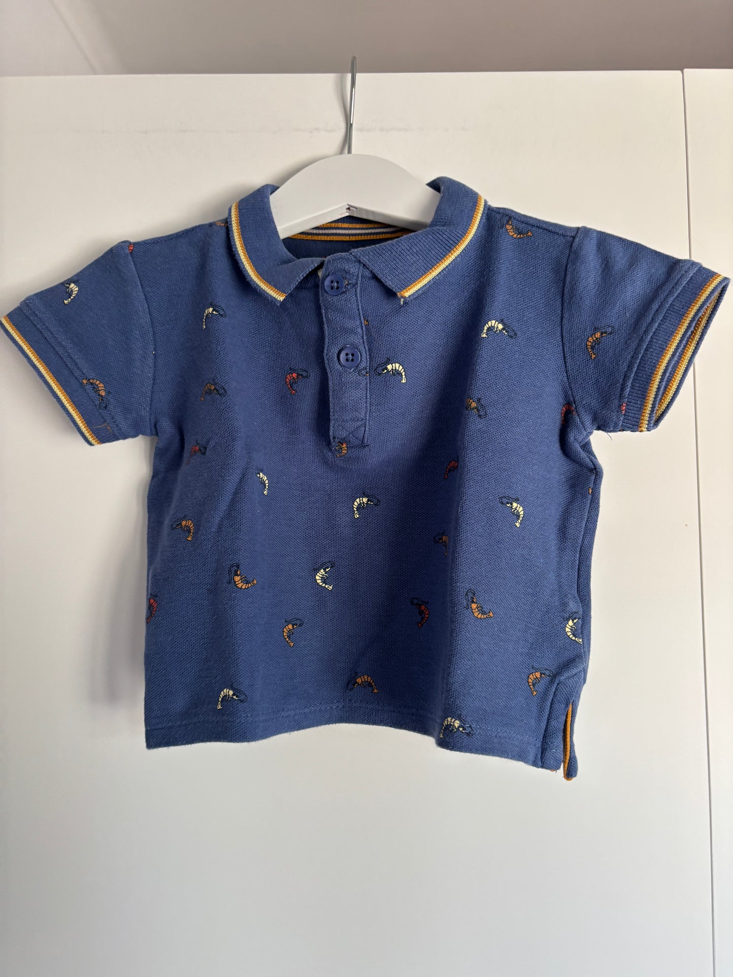 Blauwe polo met gamba's