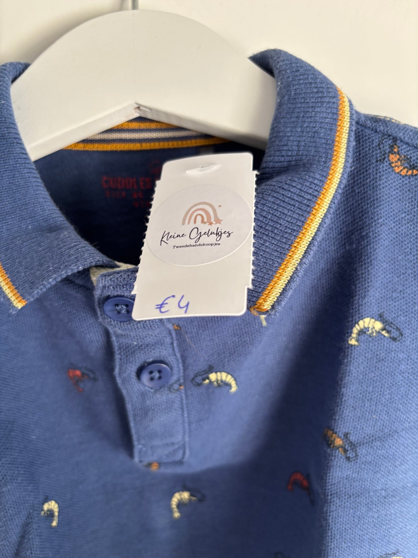 Blauwe polo met gamba's