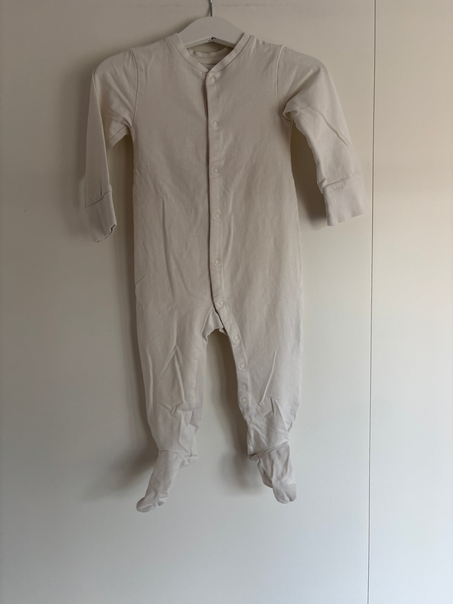 Crèmekleurige eendelige pyjama