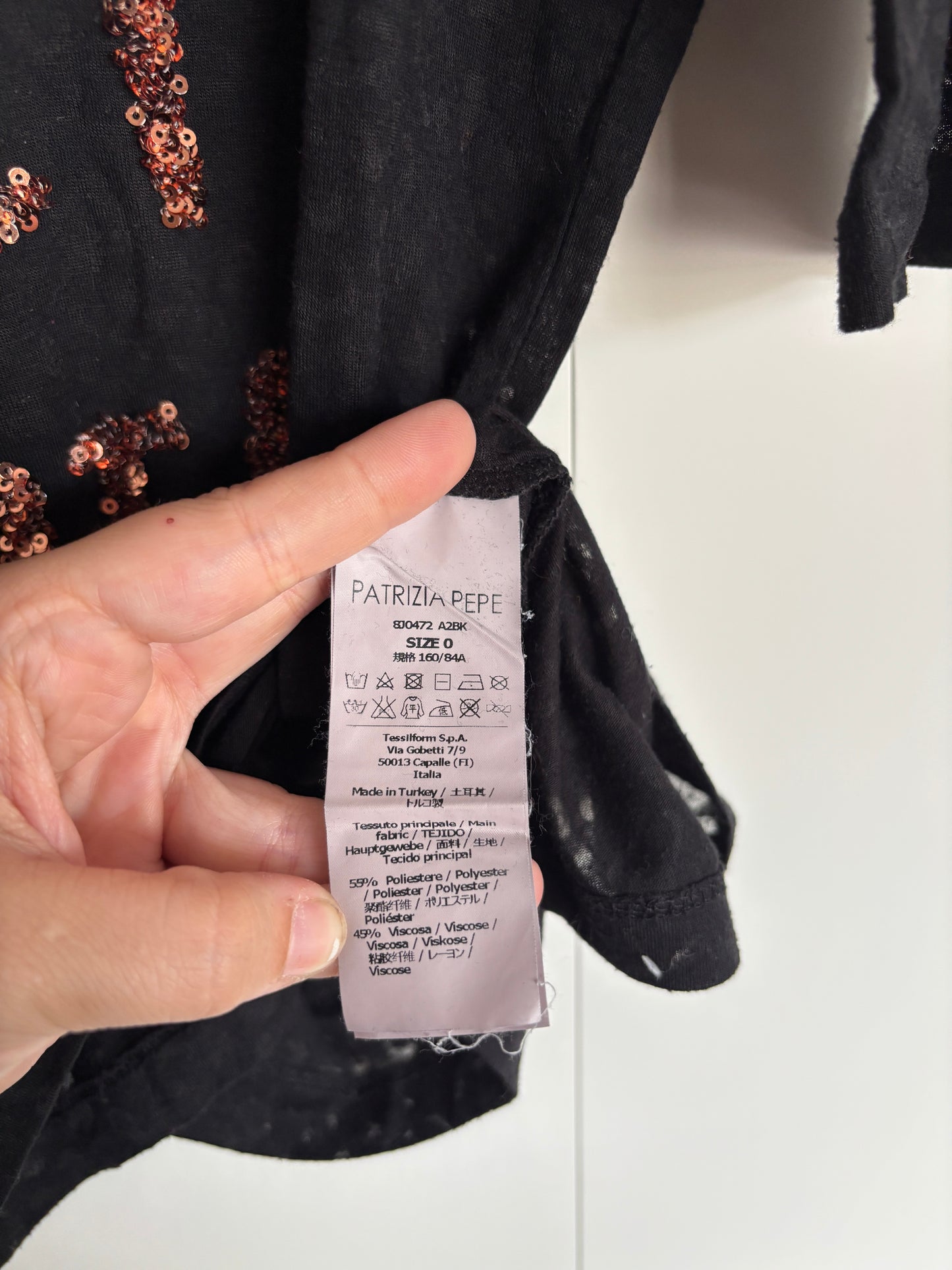 Zwarte longsleeve met panterprint