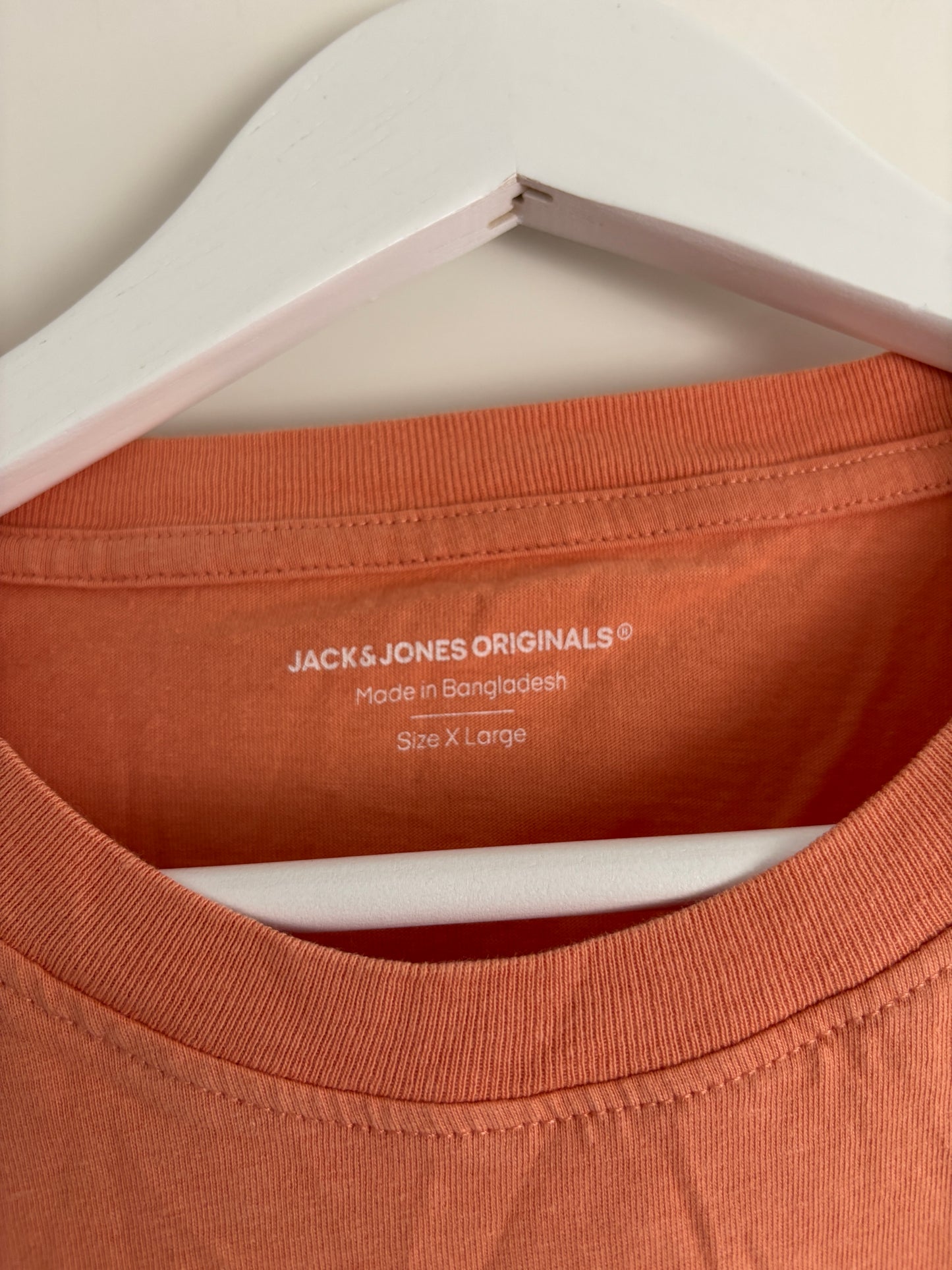 Koraalkleurige T-shirt