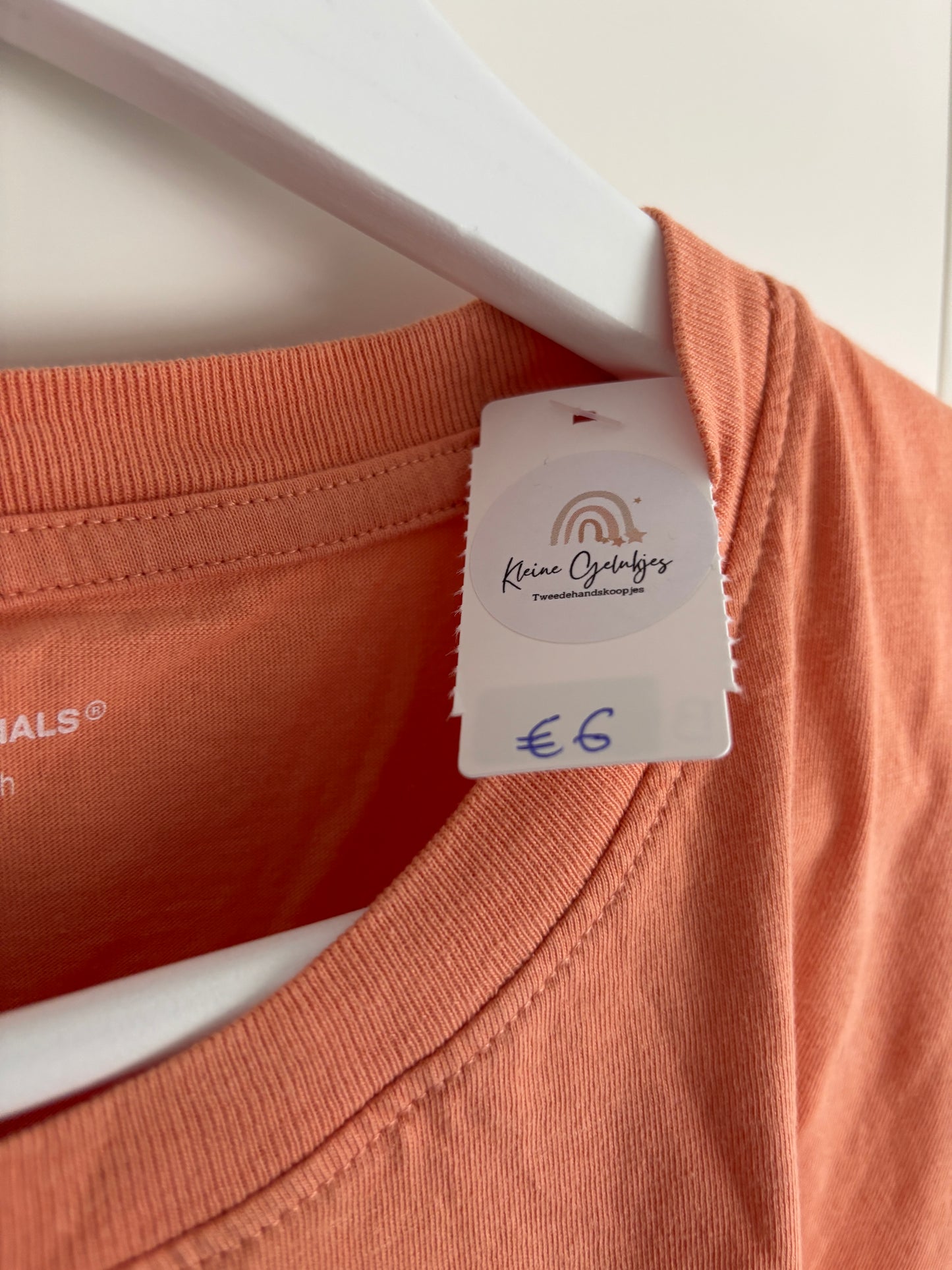 Koraalkleurige T-shirt