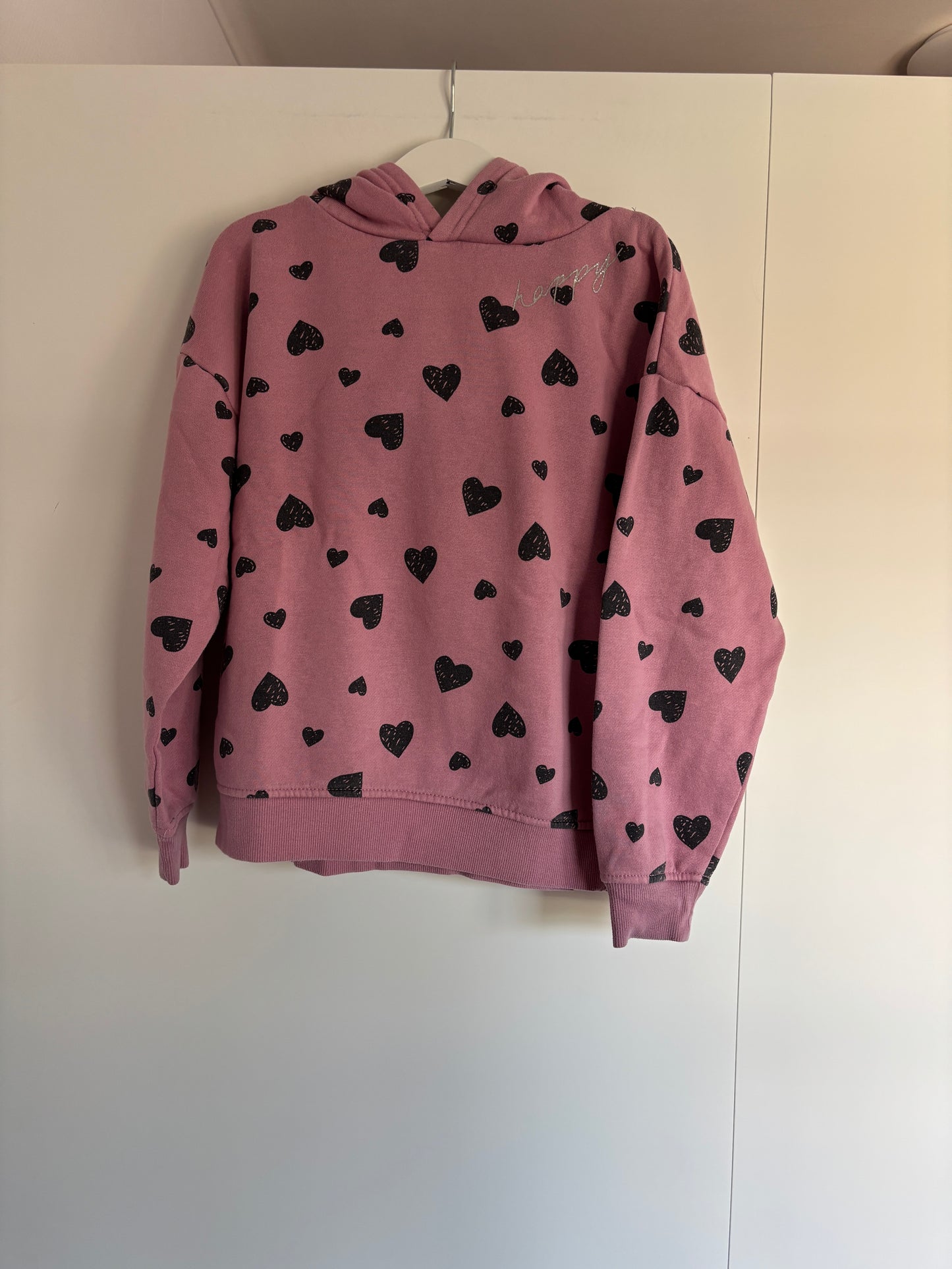 Roze sweater met hartjes