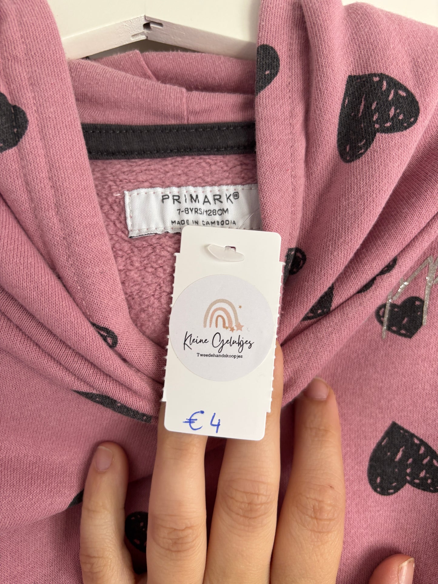 Roze sweater met hartjes