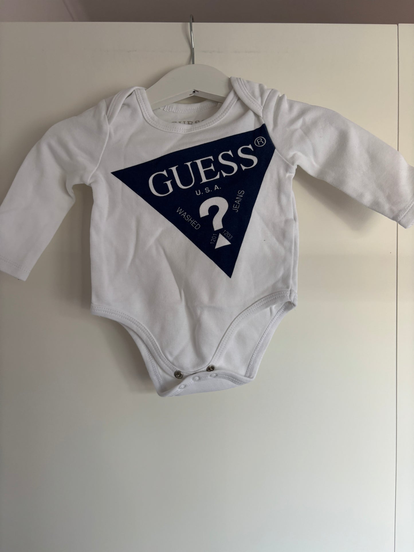 Witte romper met lange mouwen