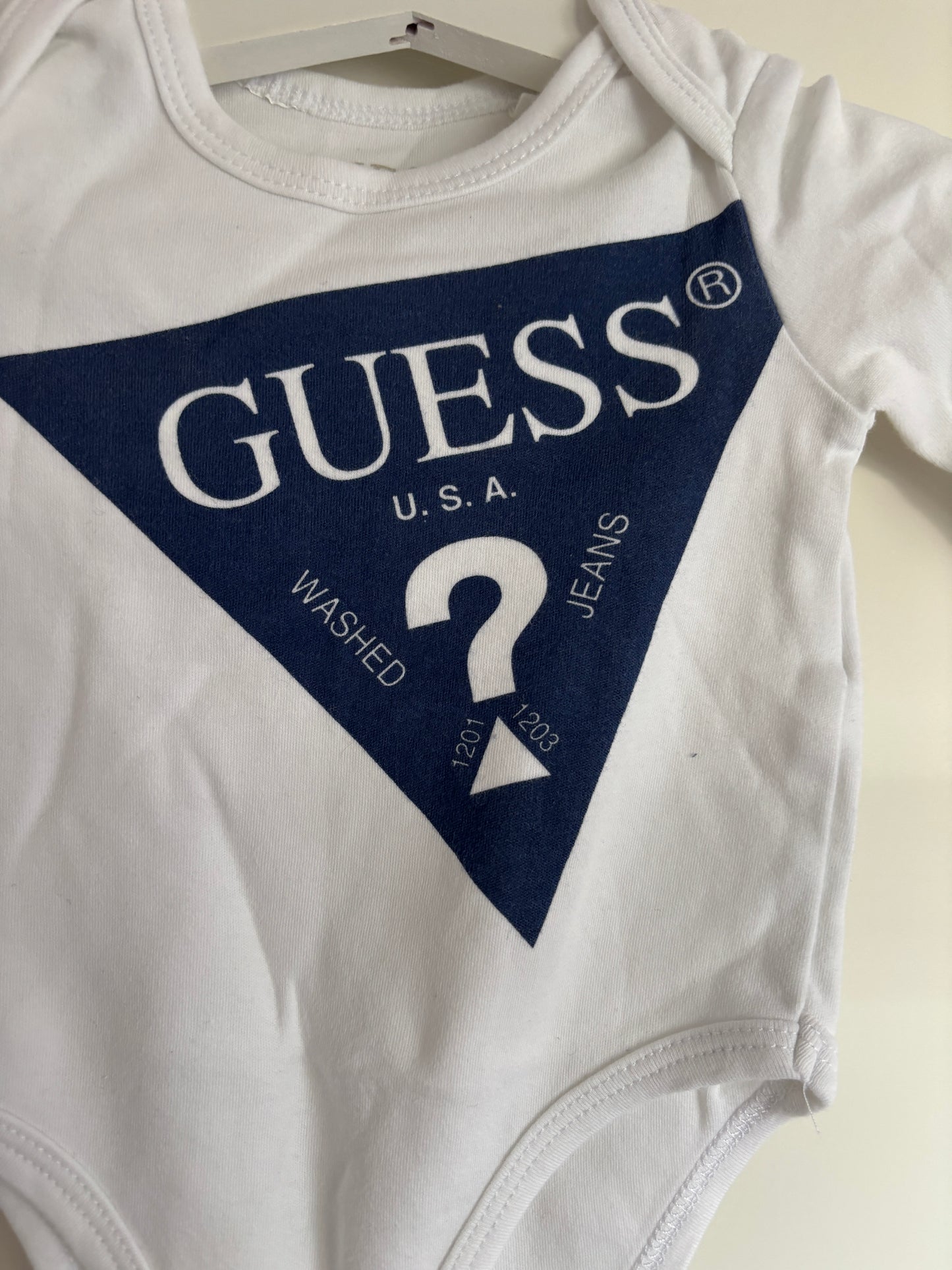 Witte romper met lange mouwen