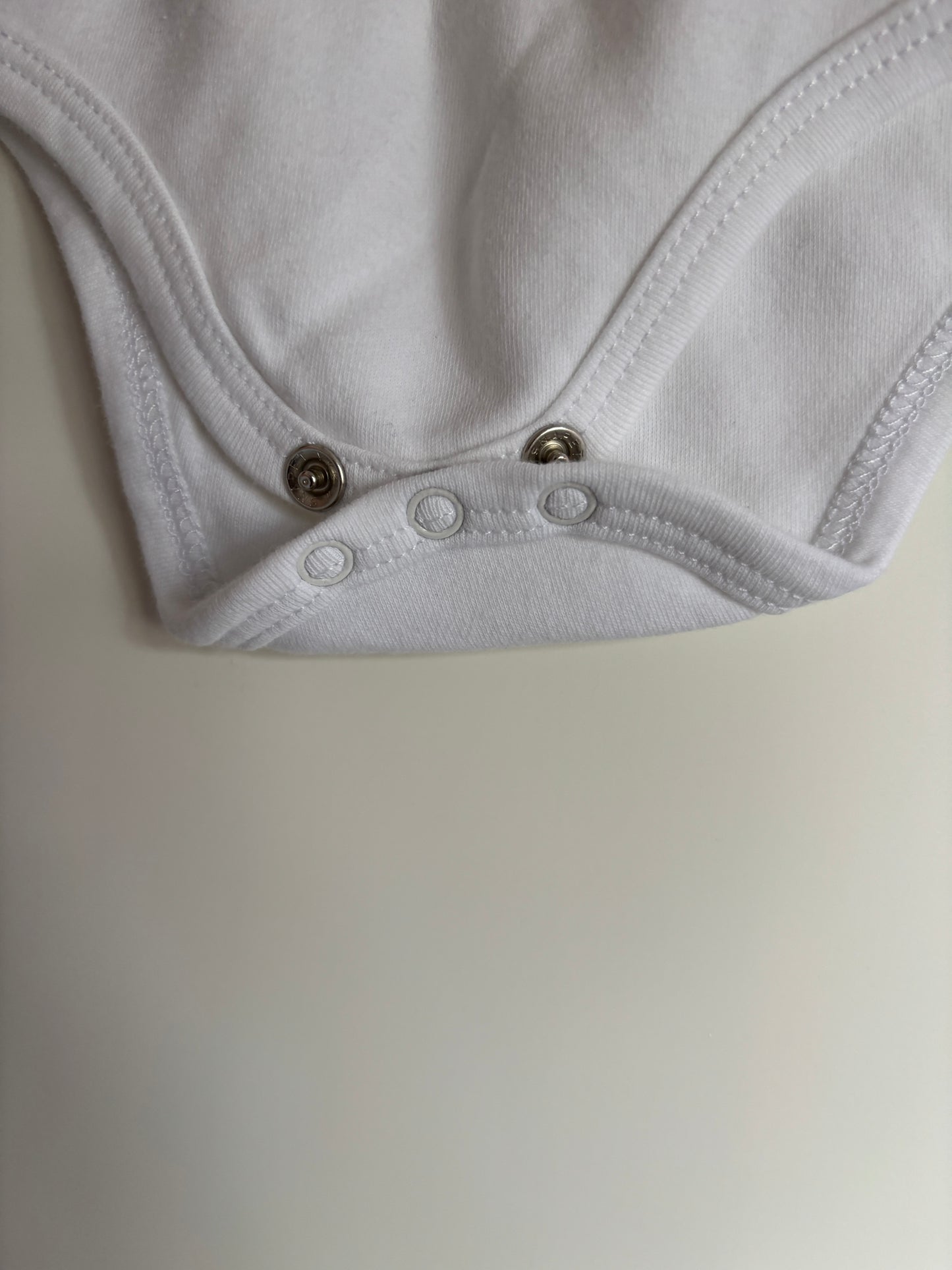 Witte romper met lange mouwen