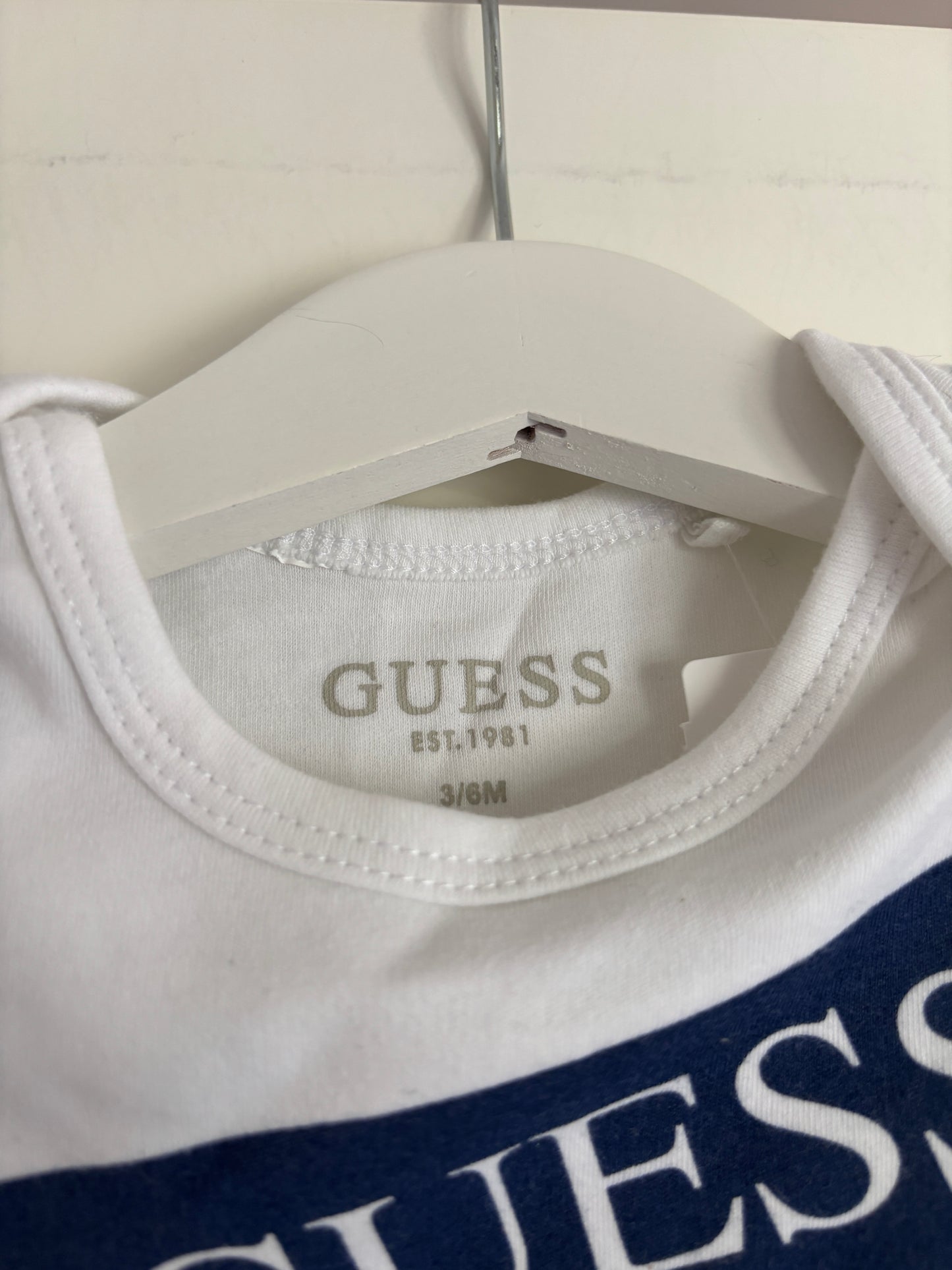 Witte romper met lange mouwen