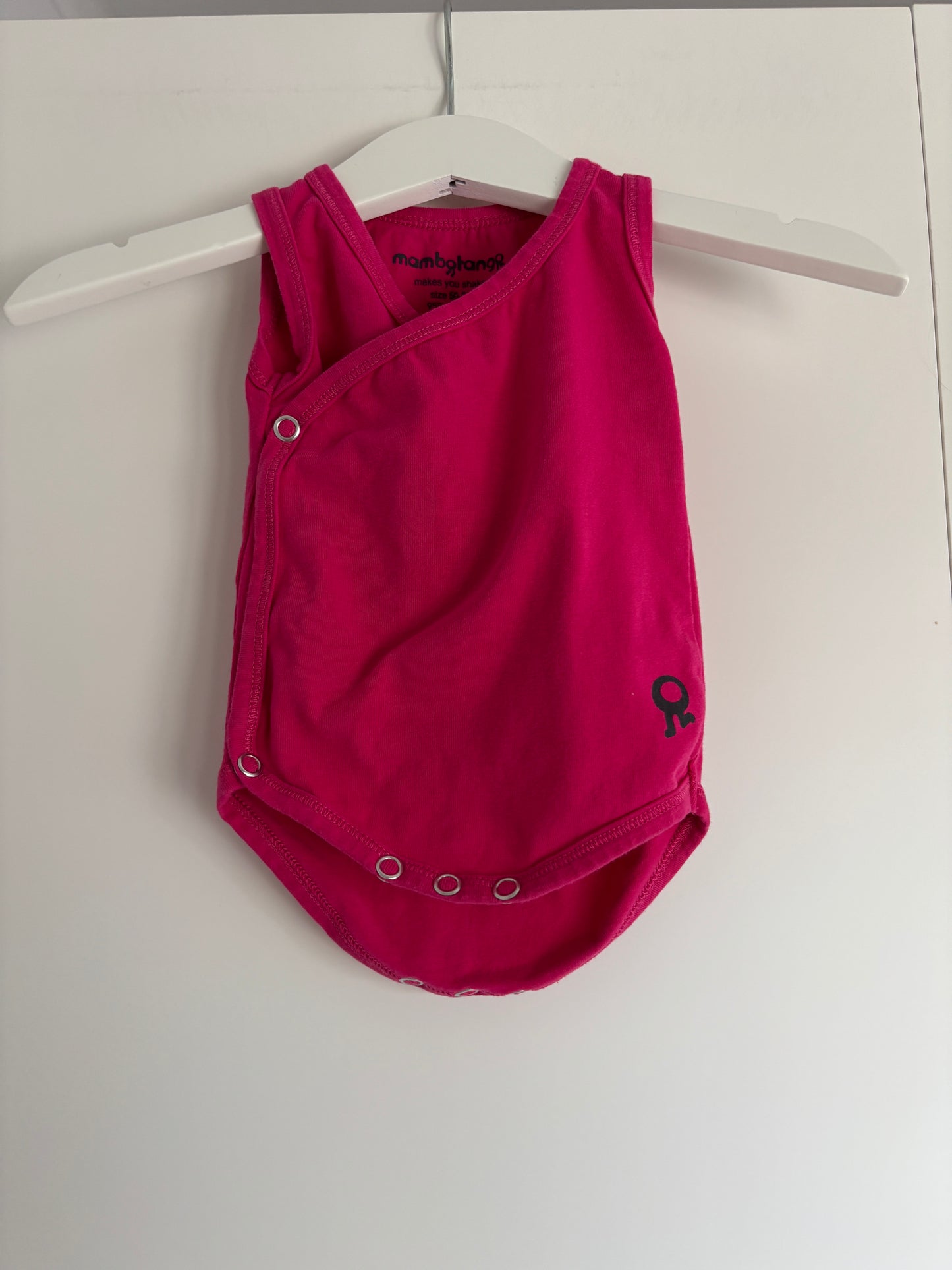 Roze overslagromper zonder mouwen