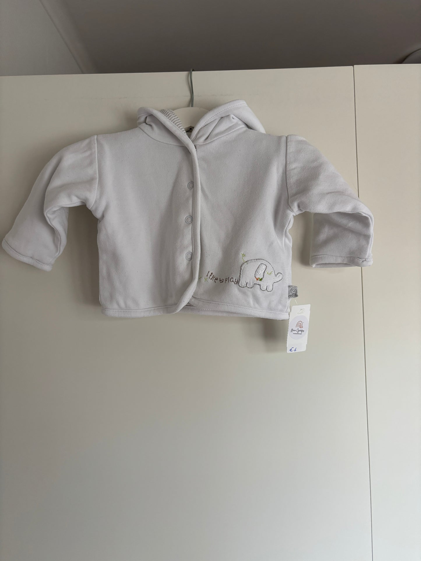 Witte vest met olifant