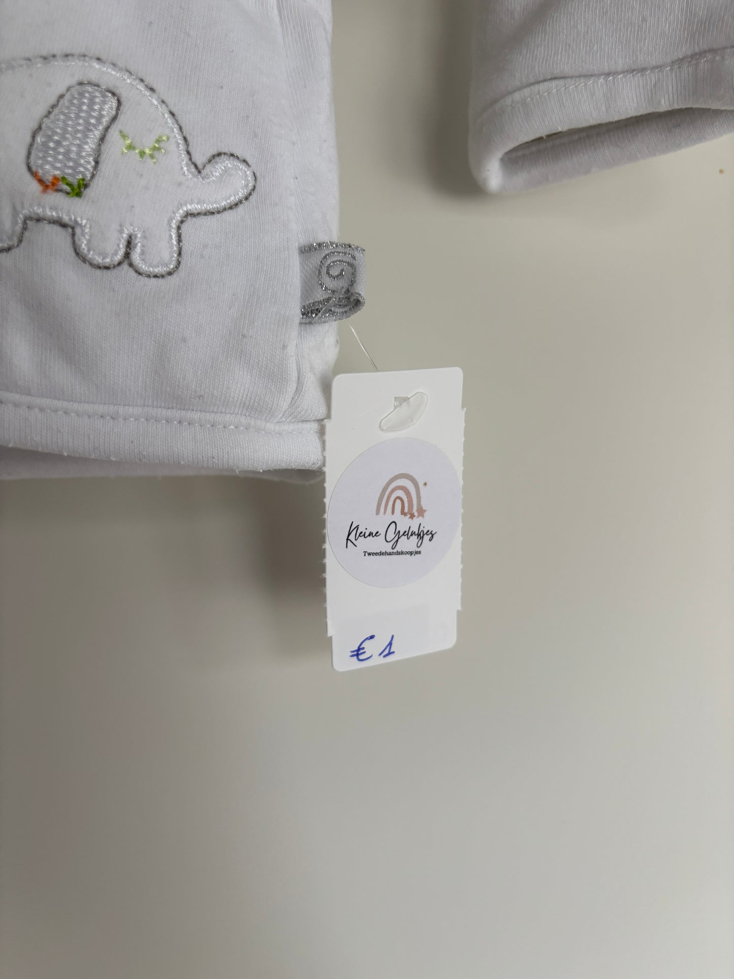 Witte vest met olifant