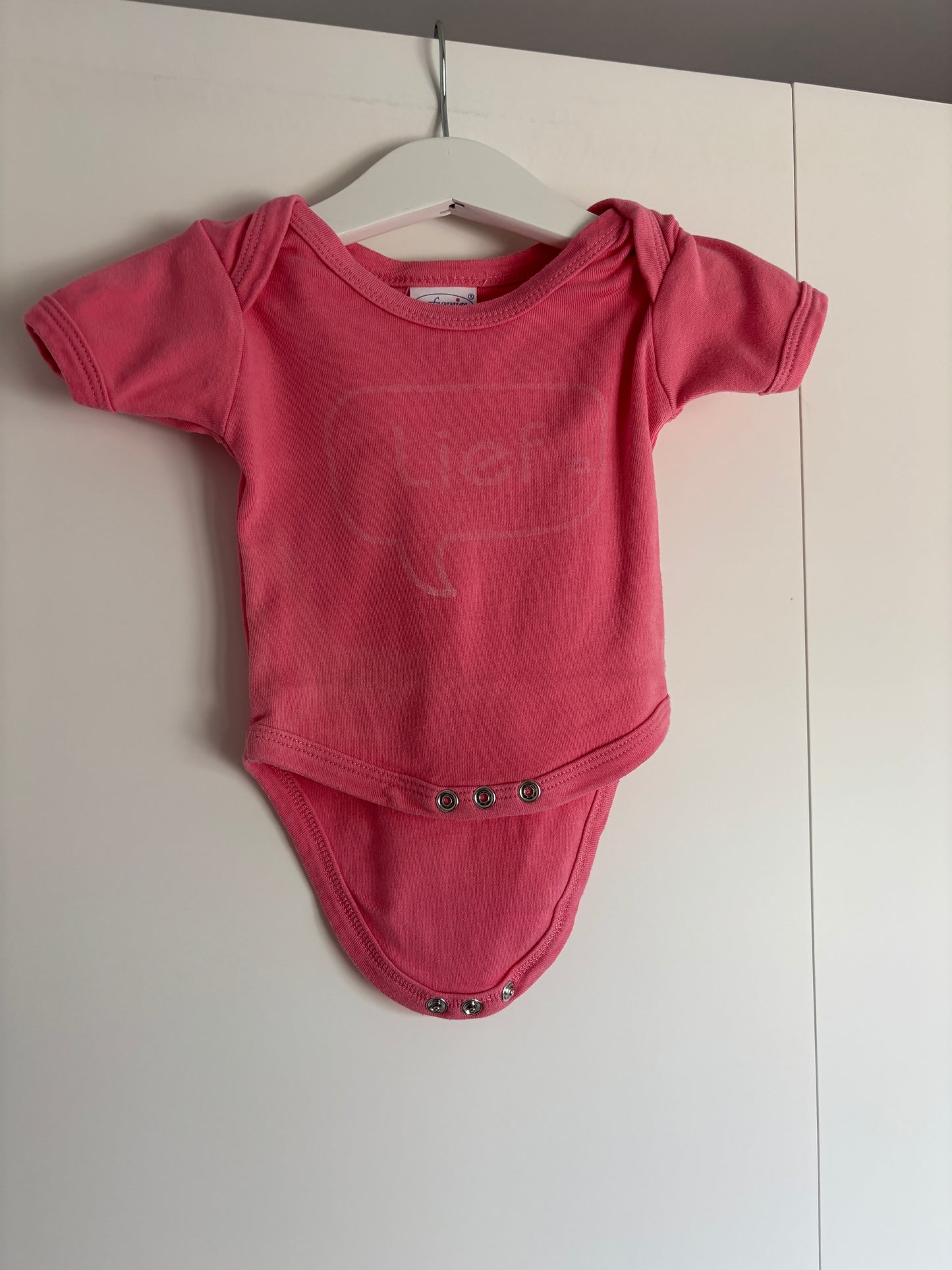 Roze romper met korte mouwen