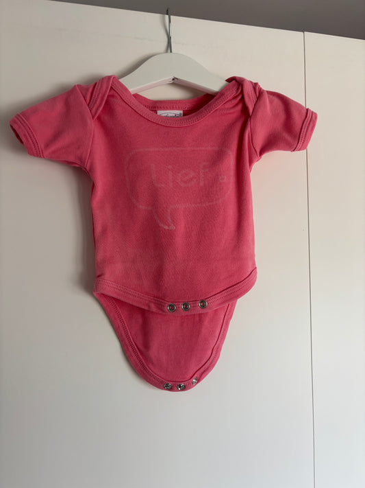 Roze romper met korte mouwen