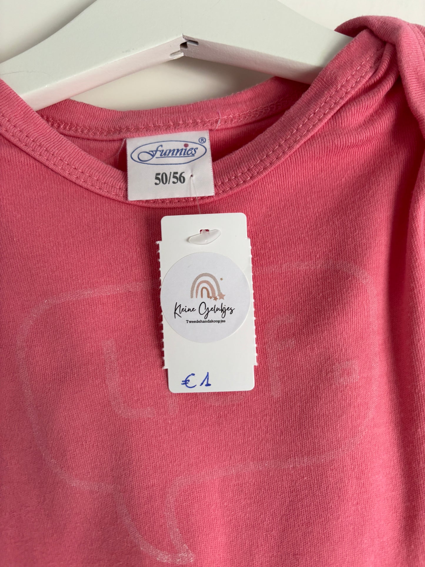 Roze romper met korte mouwen