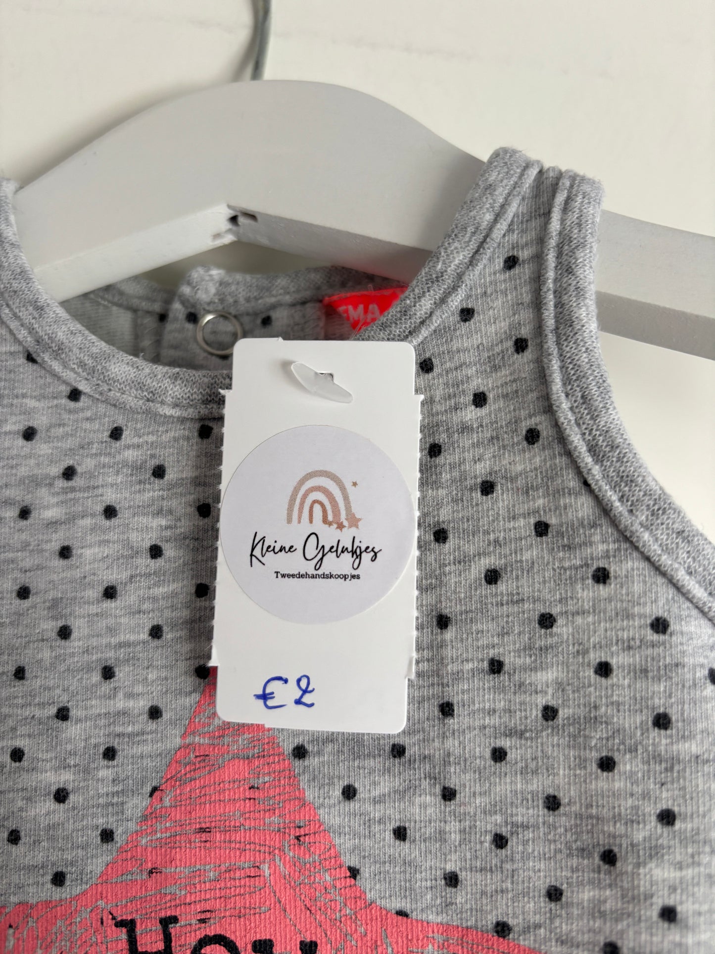 Grijs gestippeld boxpakje zonder mouwen