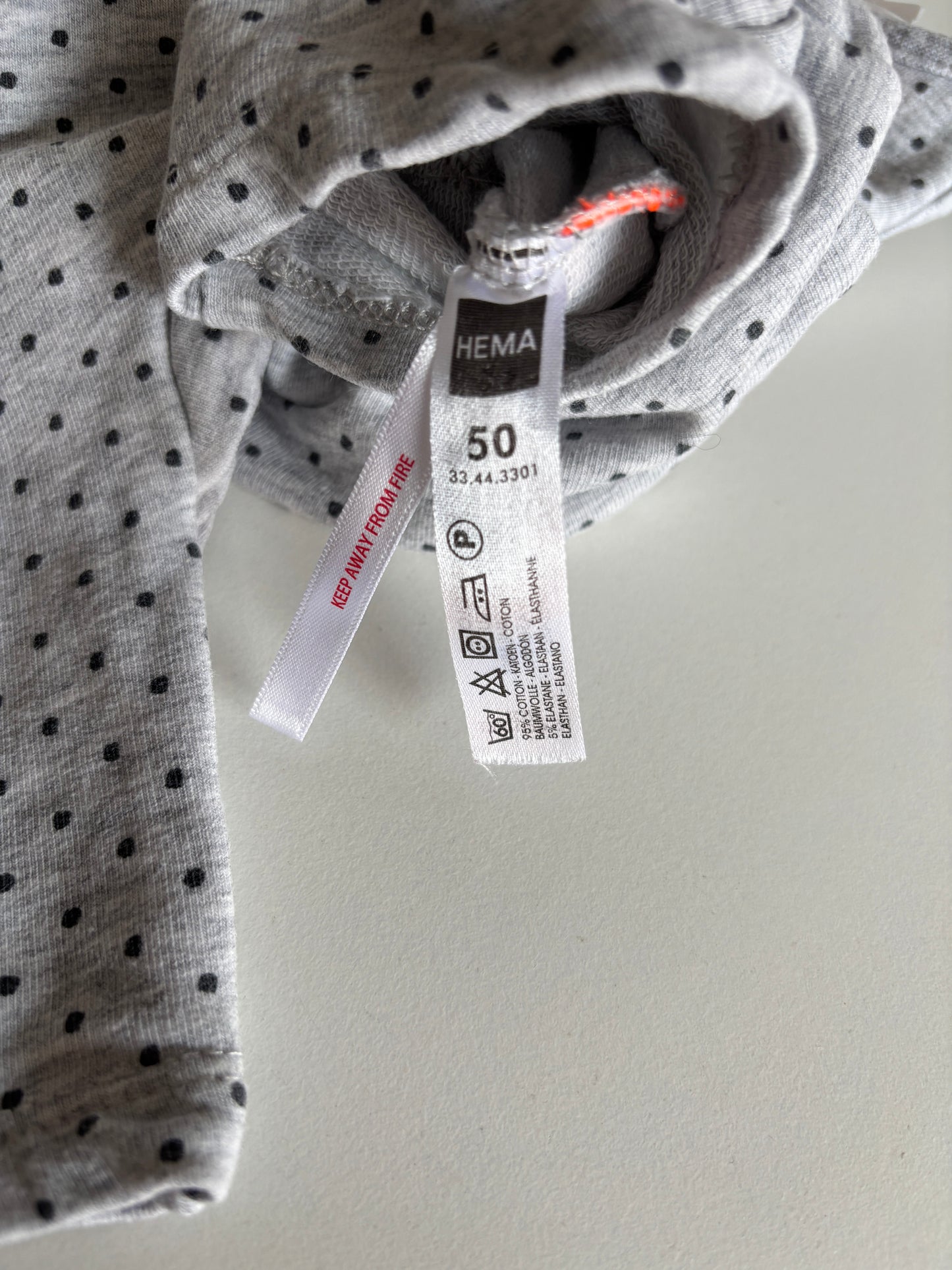 Grijs gestippeld boxpakje zonder mouwen