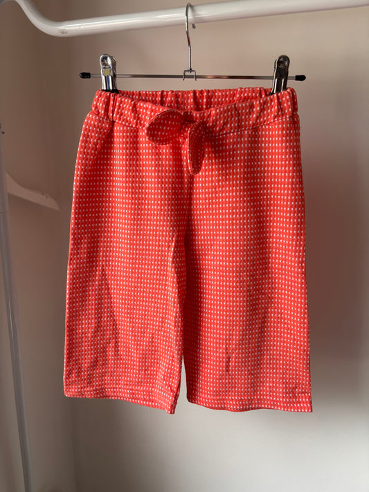 Oranje geruite broek