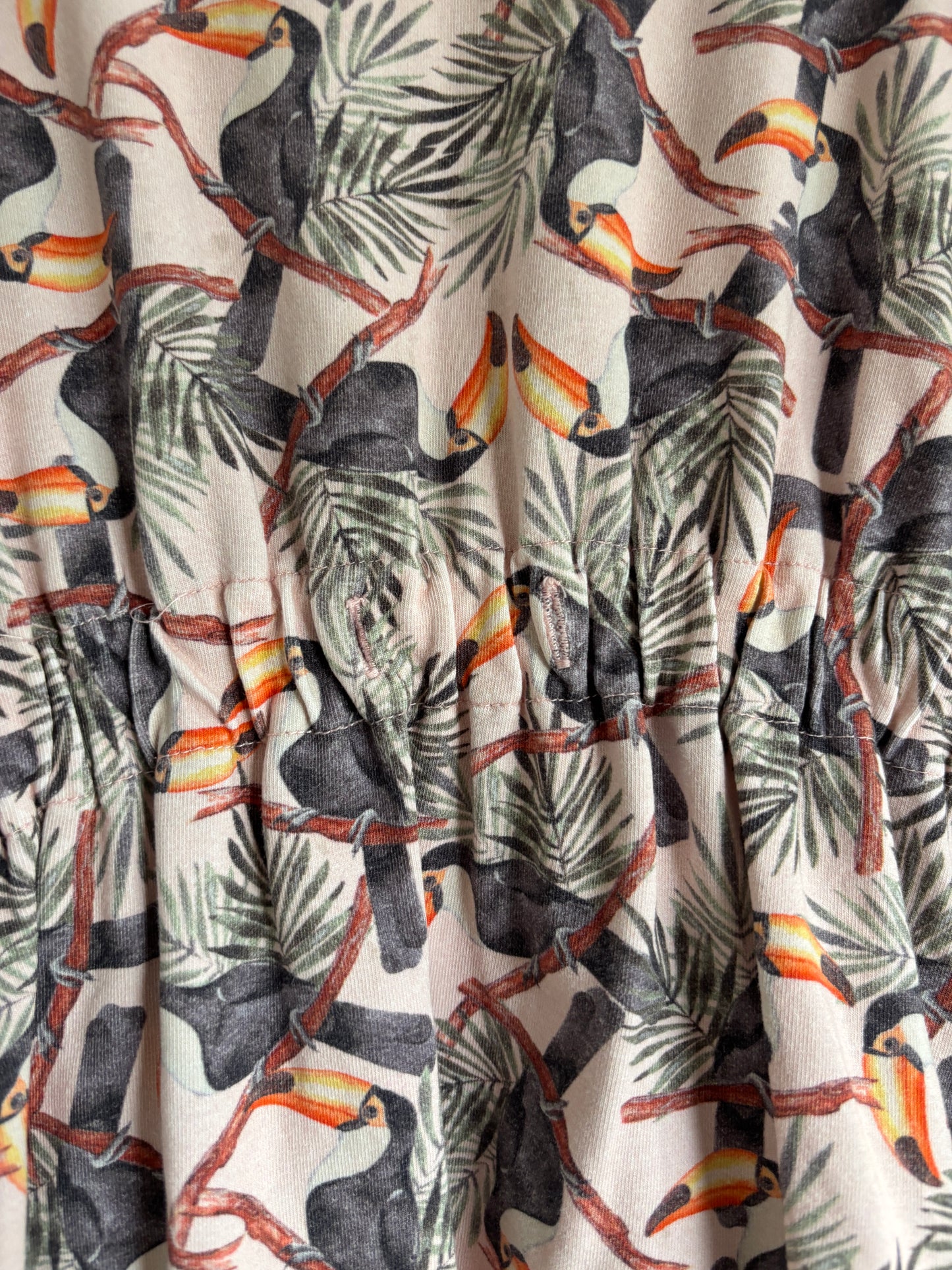 Lichtroze jurkje met pelikanen