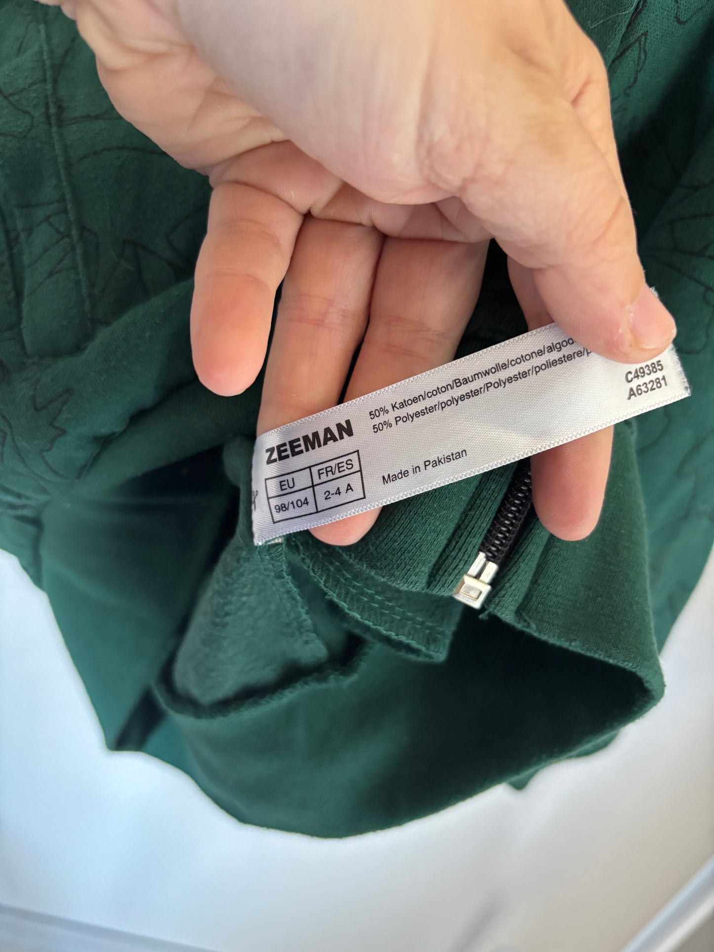 Groene vest met capuchon