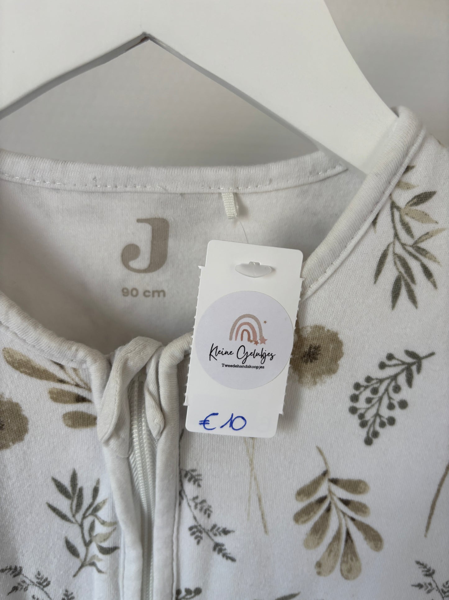 Witte slaapzak met bloemen