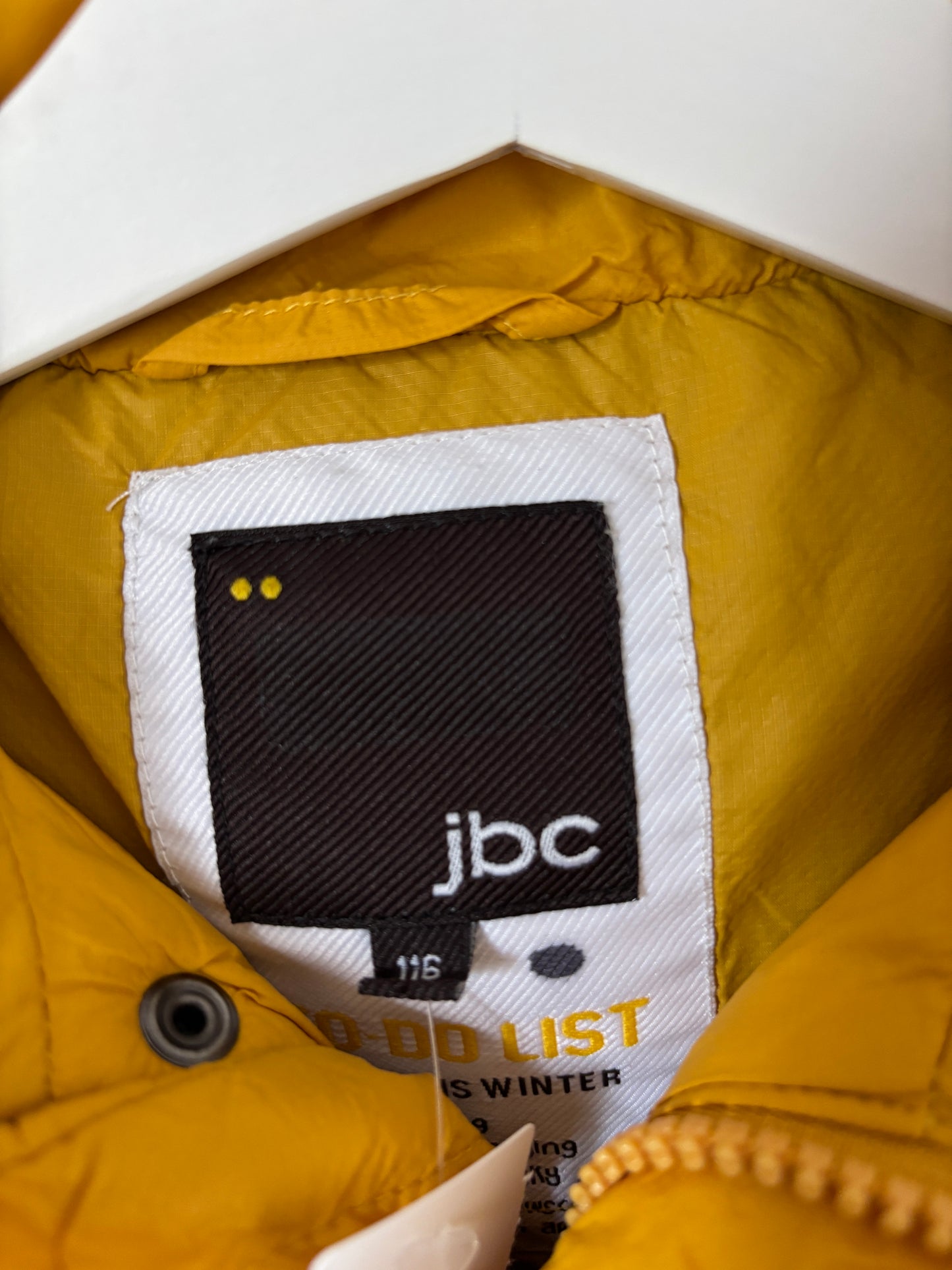 Mosterdgele winterjas