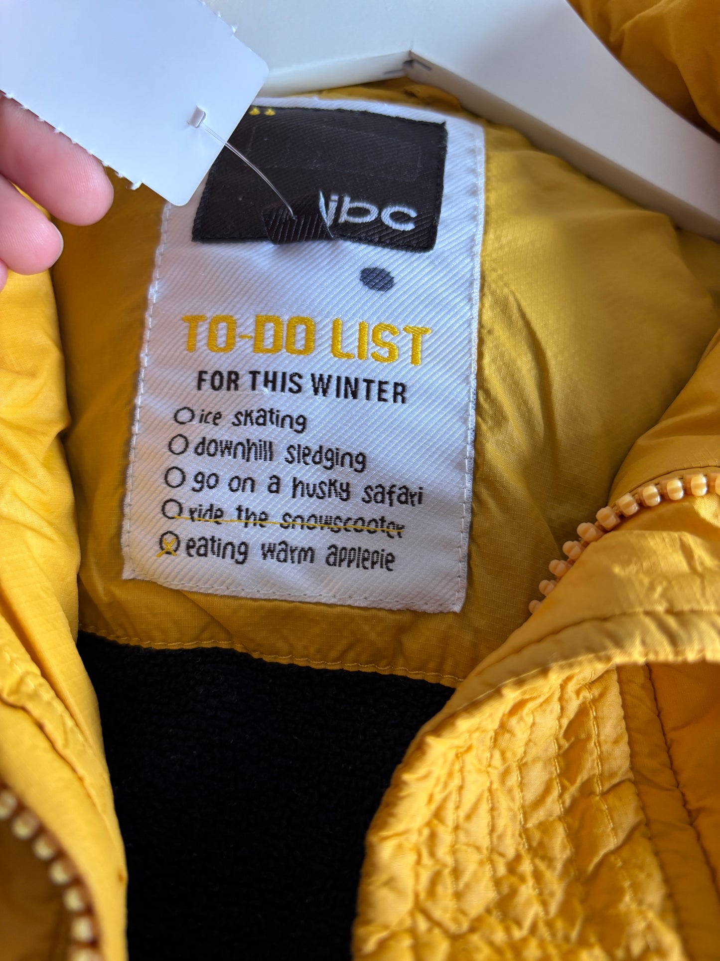 Mosterdgele winterjas