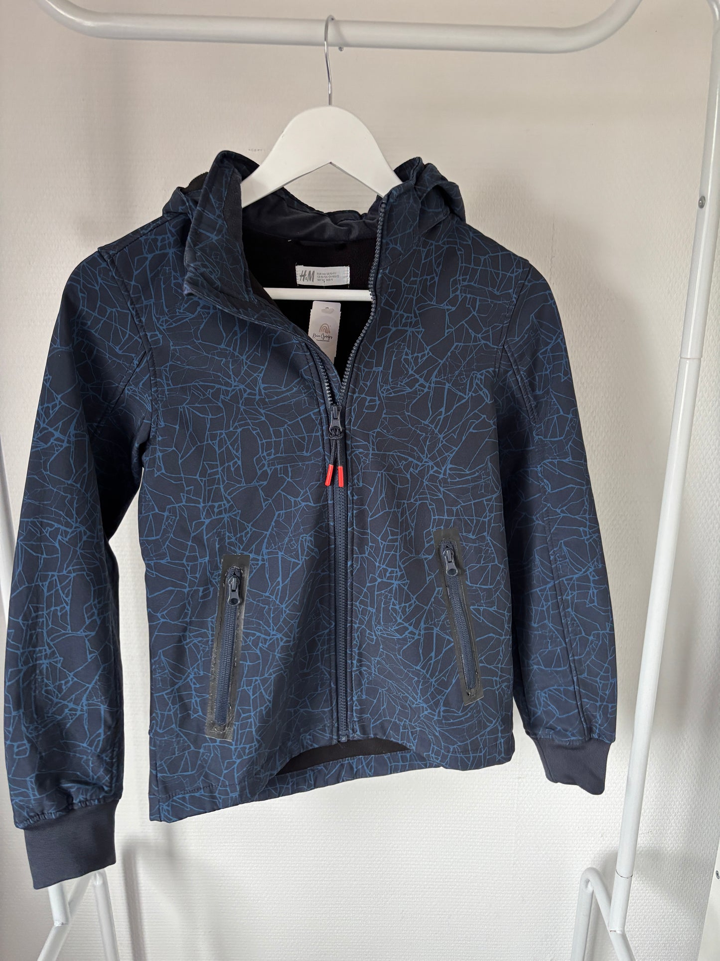 Marineblauwe winddichte jas