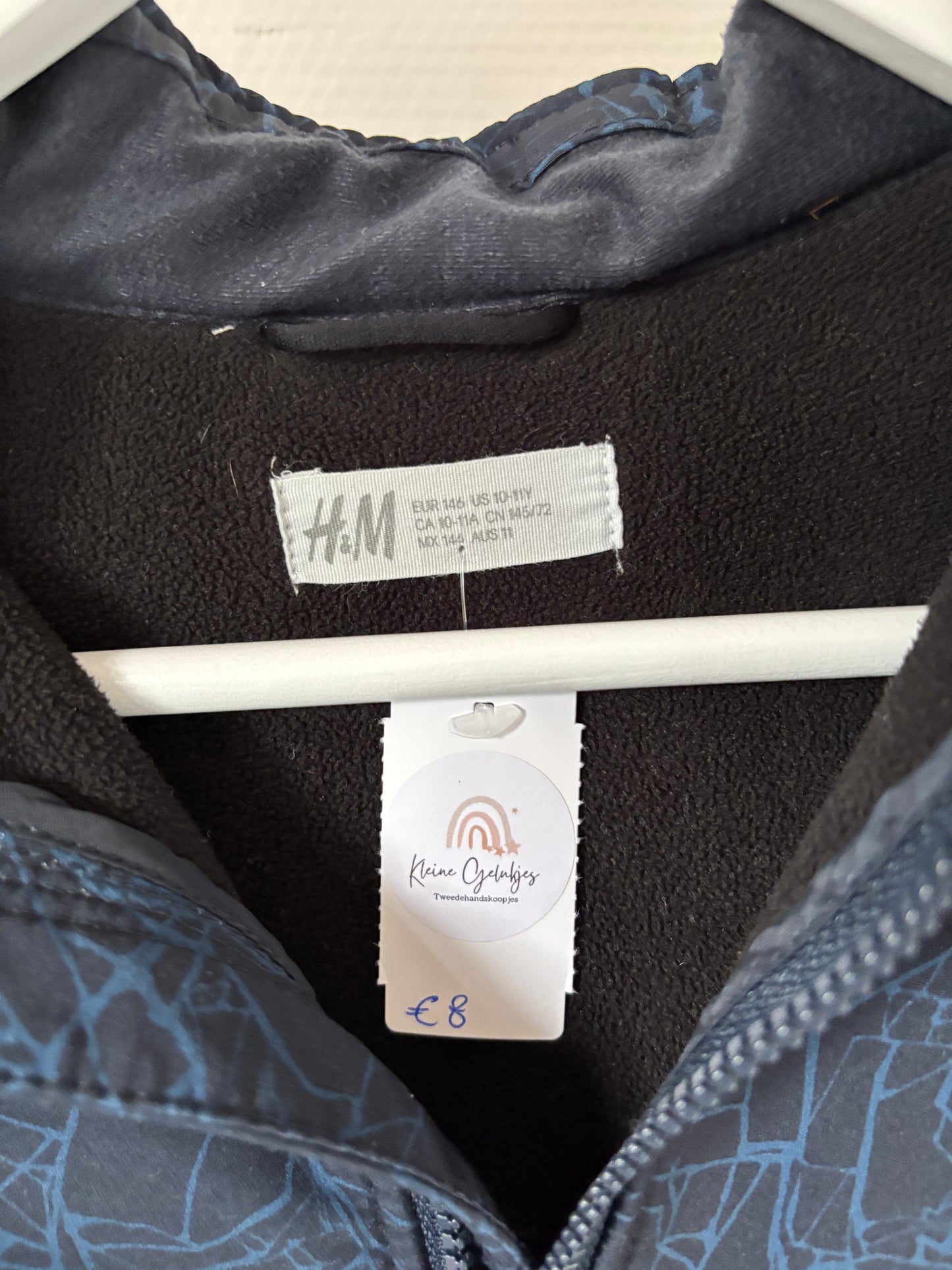 Marineblauwe winddichte jas