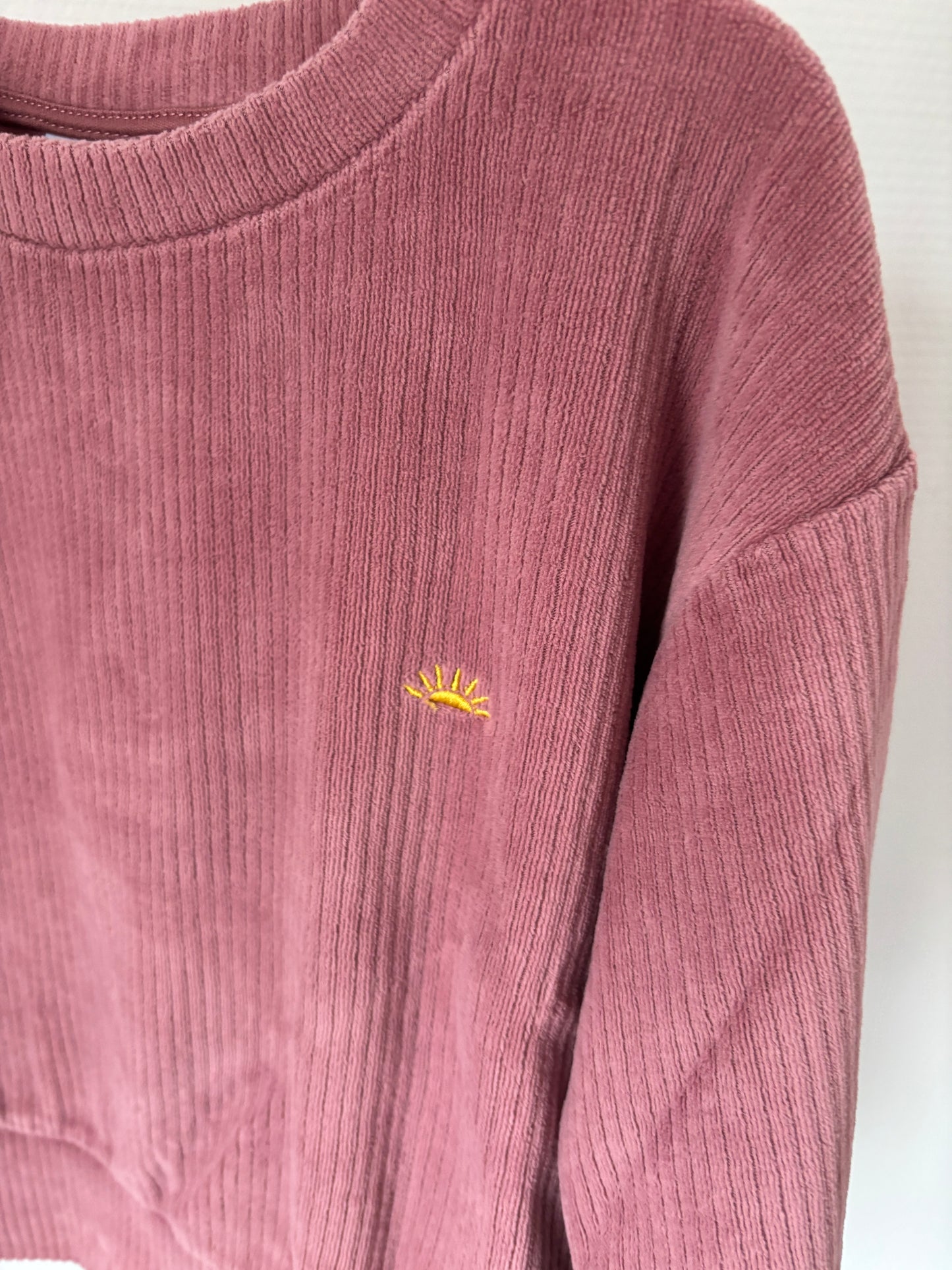 Roze ribfluwelen trui