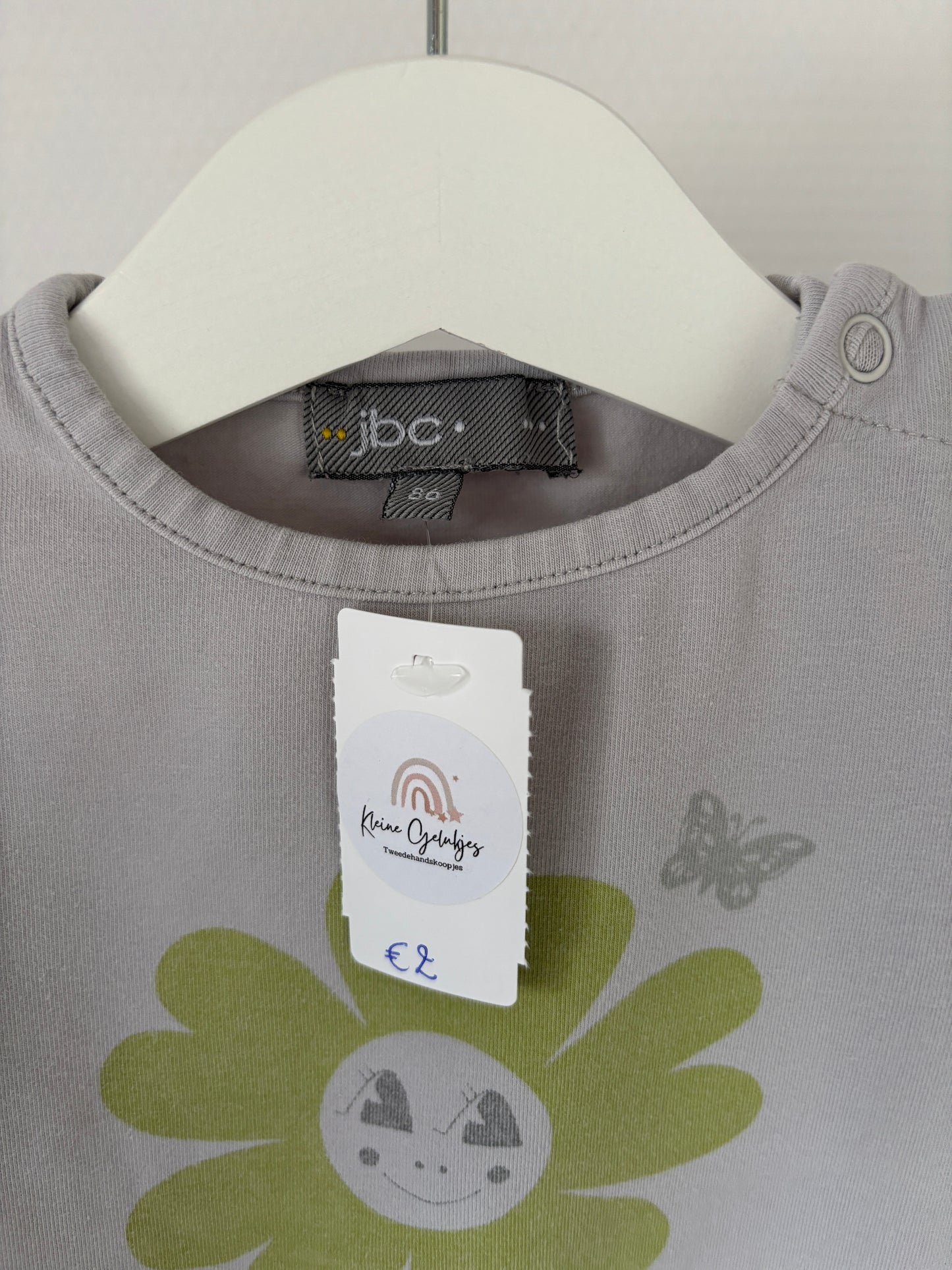 Lichtgrijze longsleeve met bloem