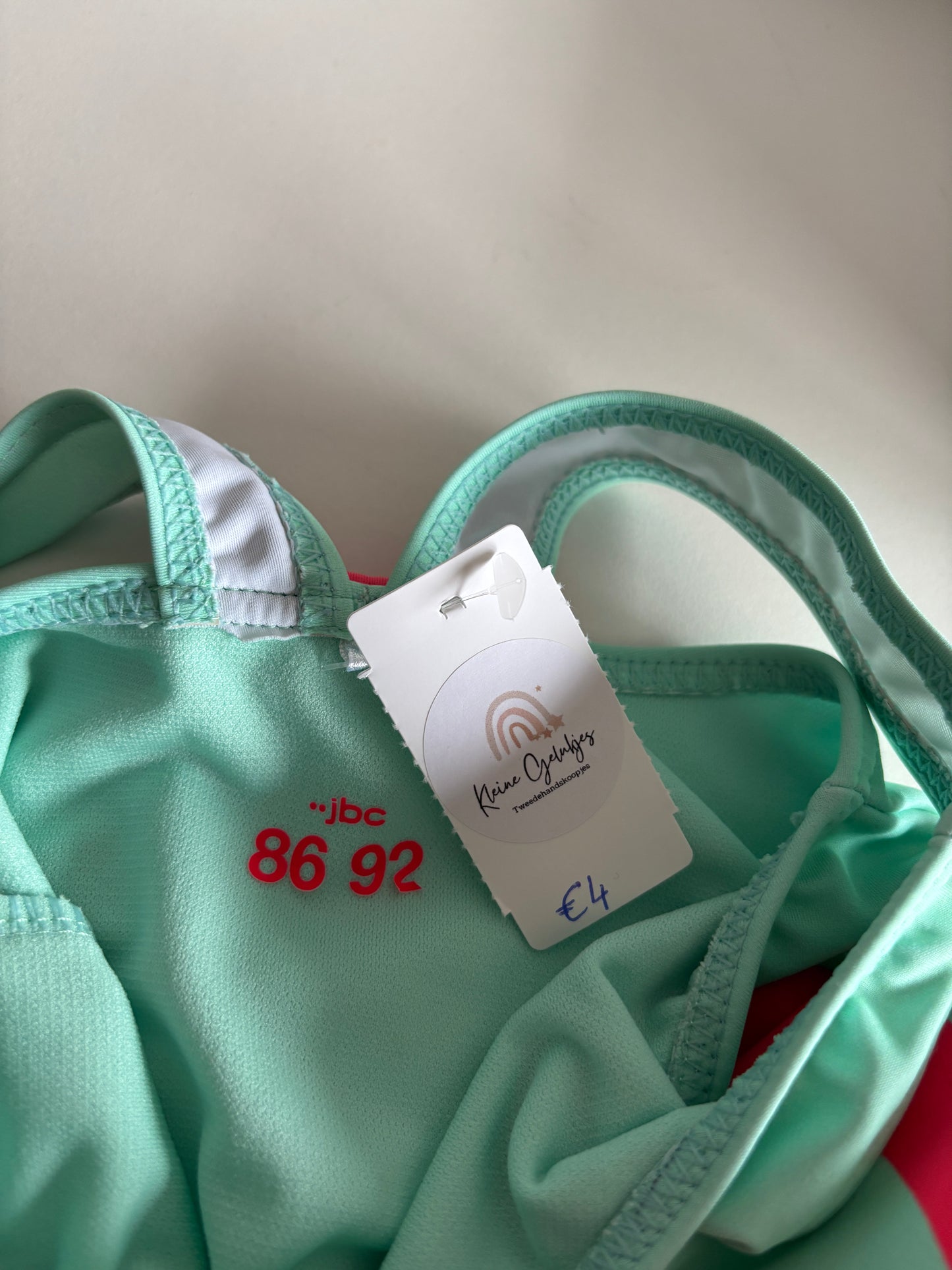 Muntgroen badpak met flamingo's