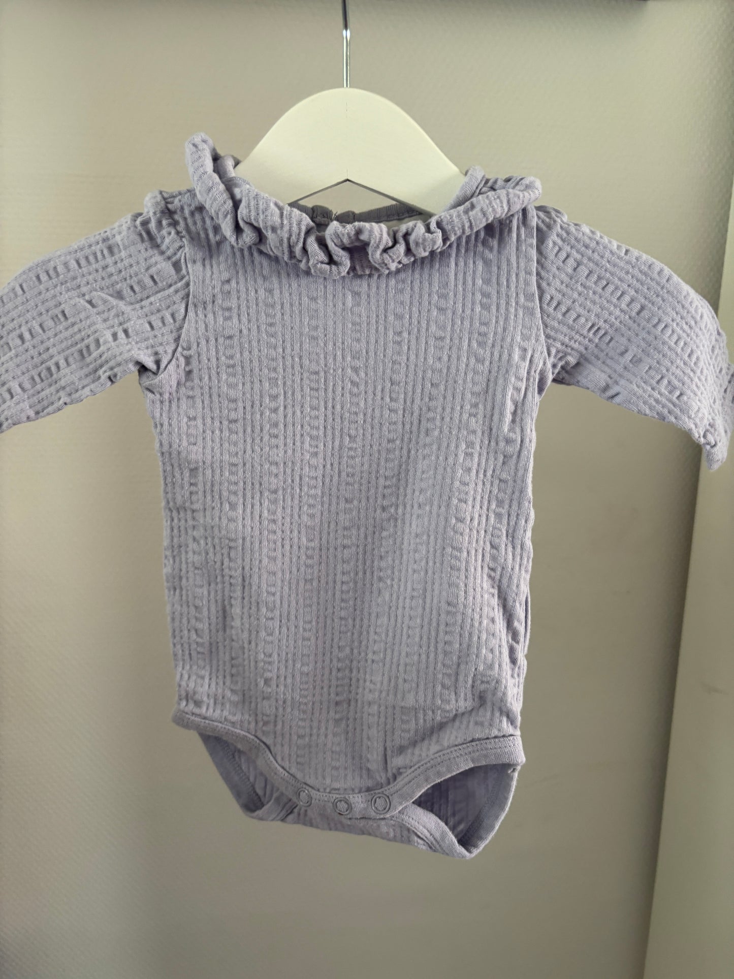 Lila romper met lange mouwen