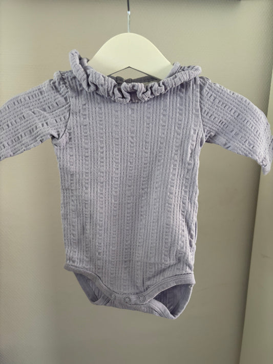 Lila romper met lange mouwen