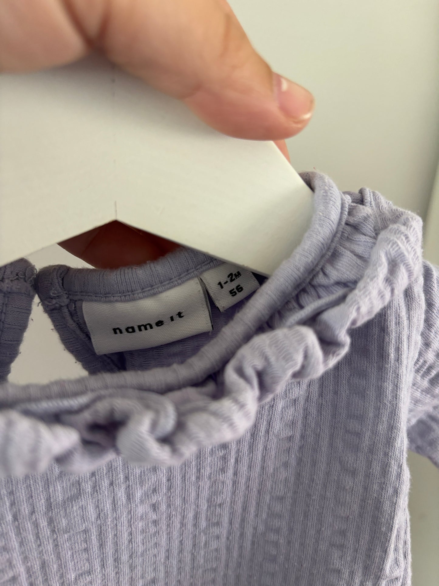 Lila romper met lange mouwen