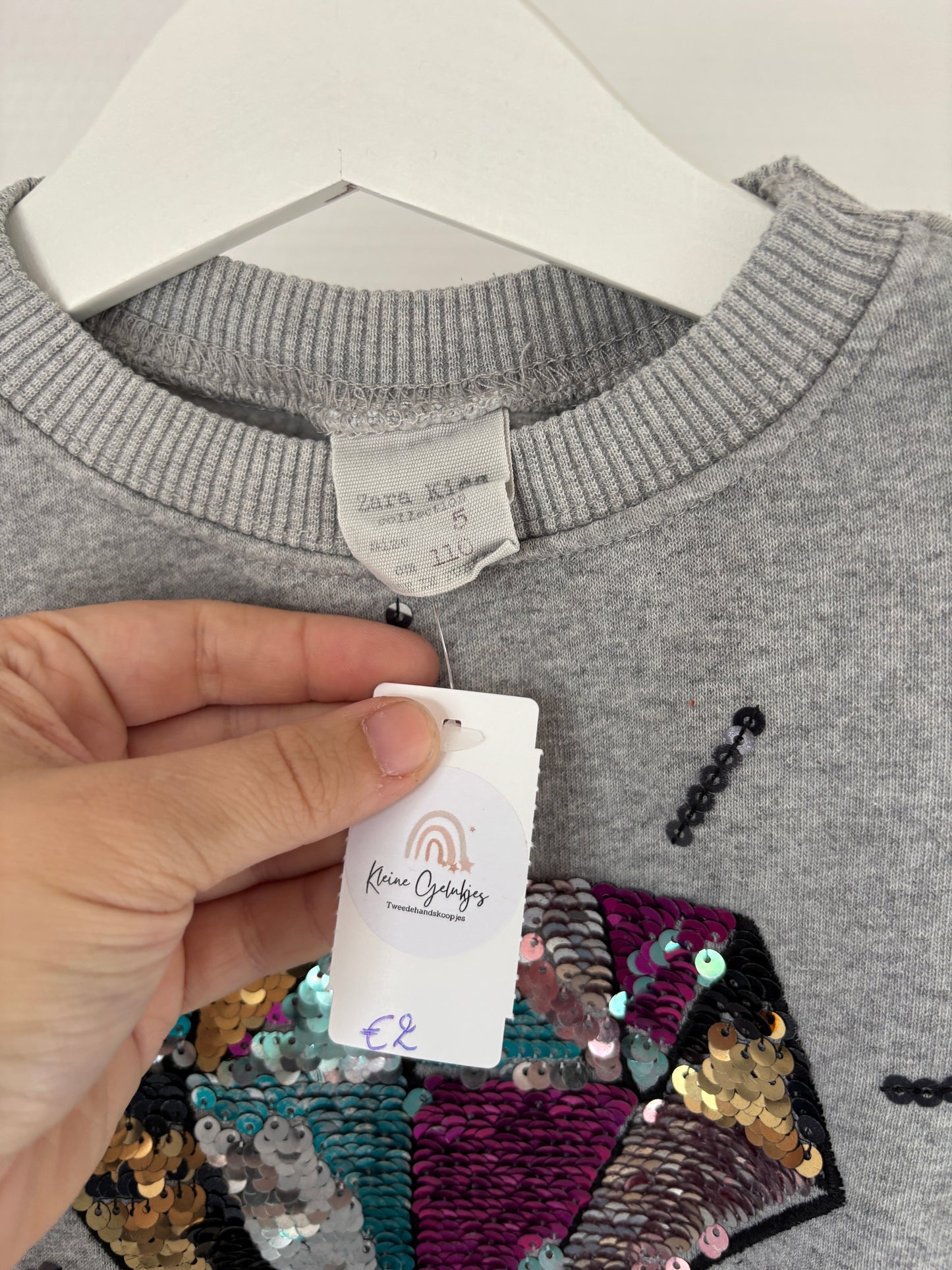 Grijze sweater met diamant