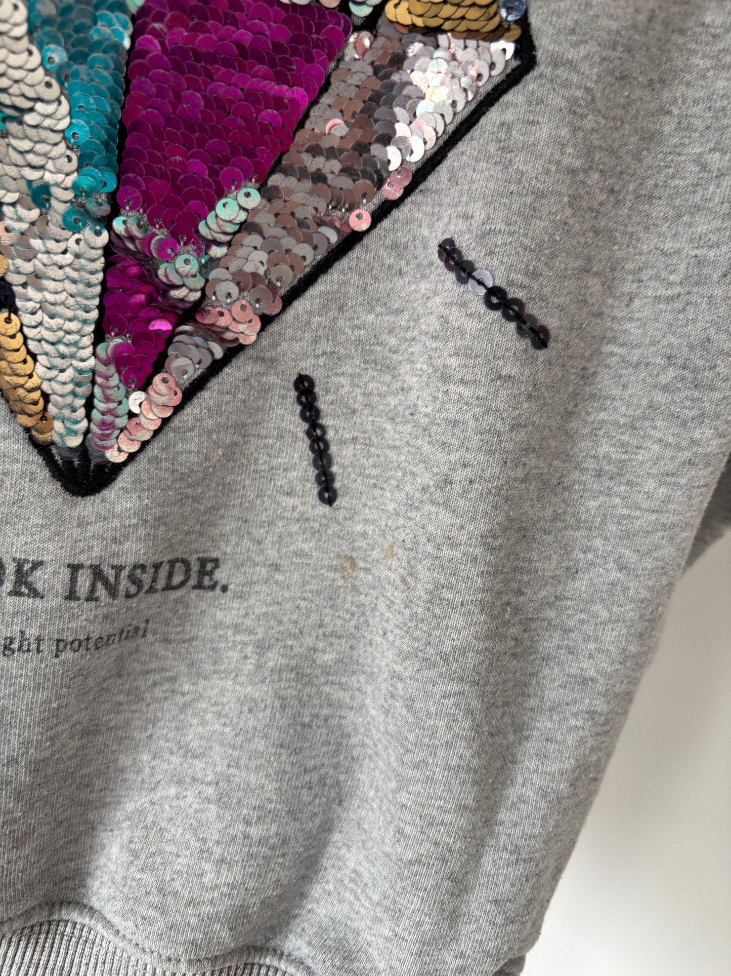 Grijze sweater met diamant