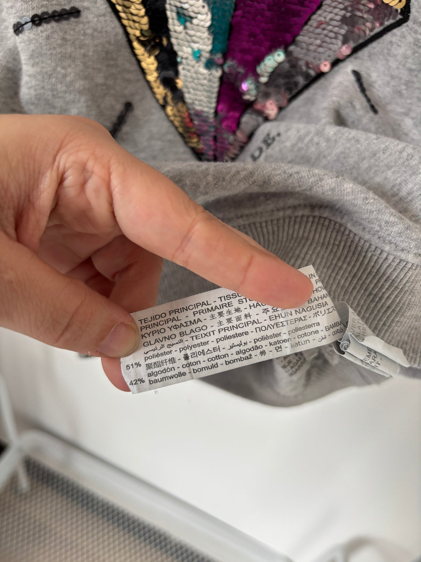 Grijze sweater met diamant