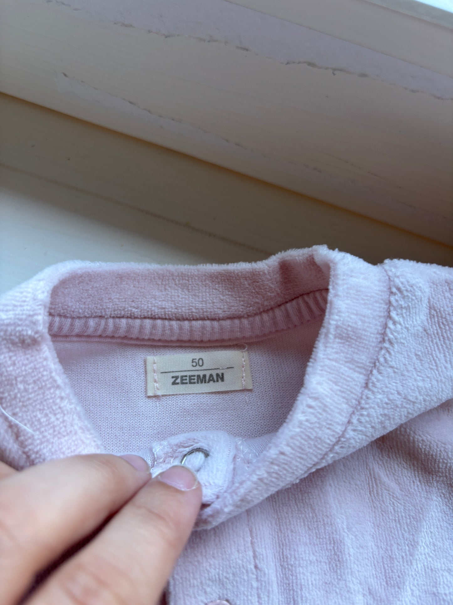 Lichtroze eendelige winterpyjama